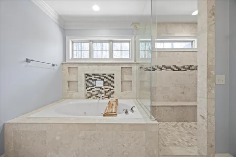 a view of a livingroom with furniture and a window