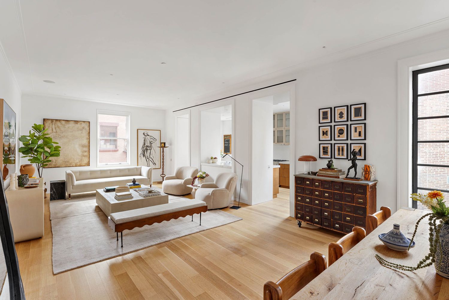 a living room with furniture rug and window