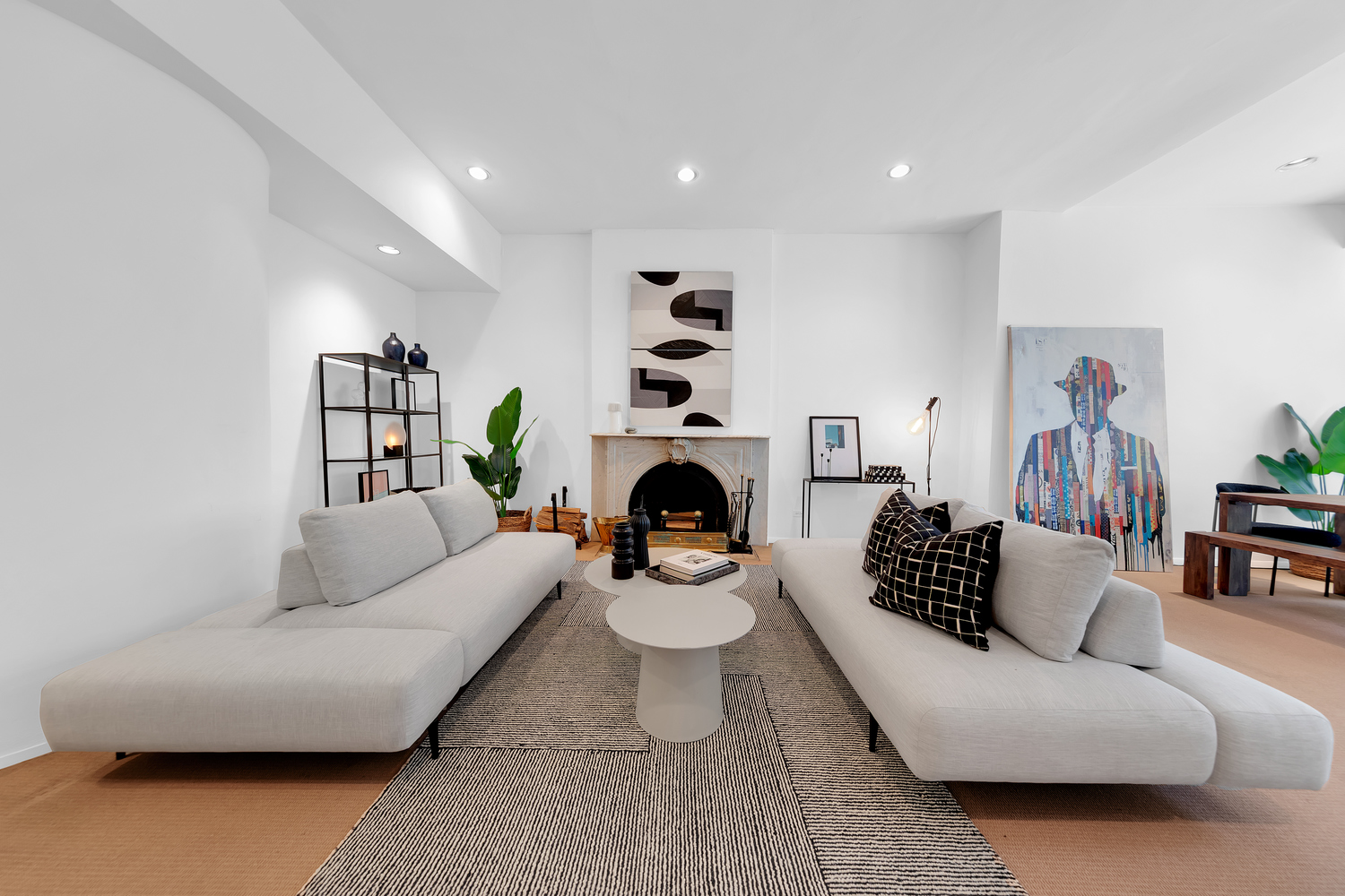 206 East 30th Street Manhattan, NY 10016 - Photo 3 of 17 a living room with furniture a fireplace and a flat screen tv