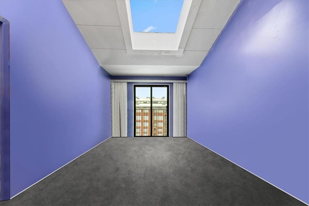 1431 East 108th Street, Unit 10E Brooklyn, NY 11236 - Photo 4 of 10 a view of an empty room with a window