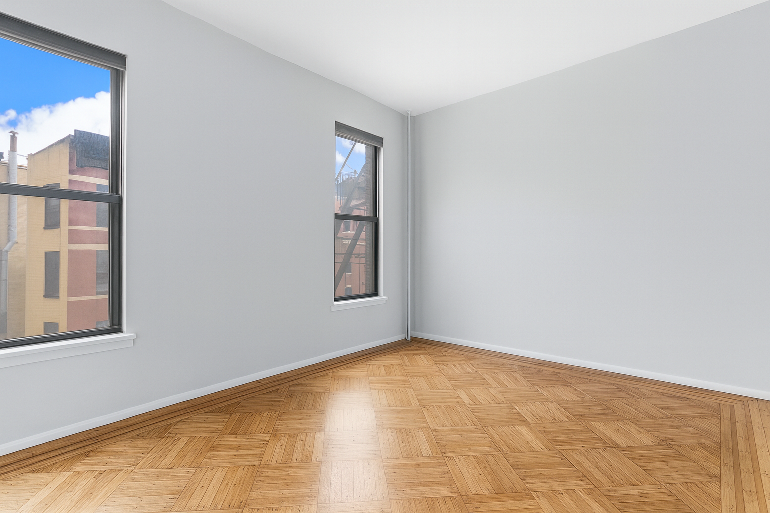 394 Lincoln Place, Unit C2 Brooklyn, NY 11238 - Photo 9 of 13 a view of an empty room with a window