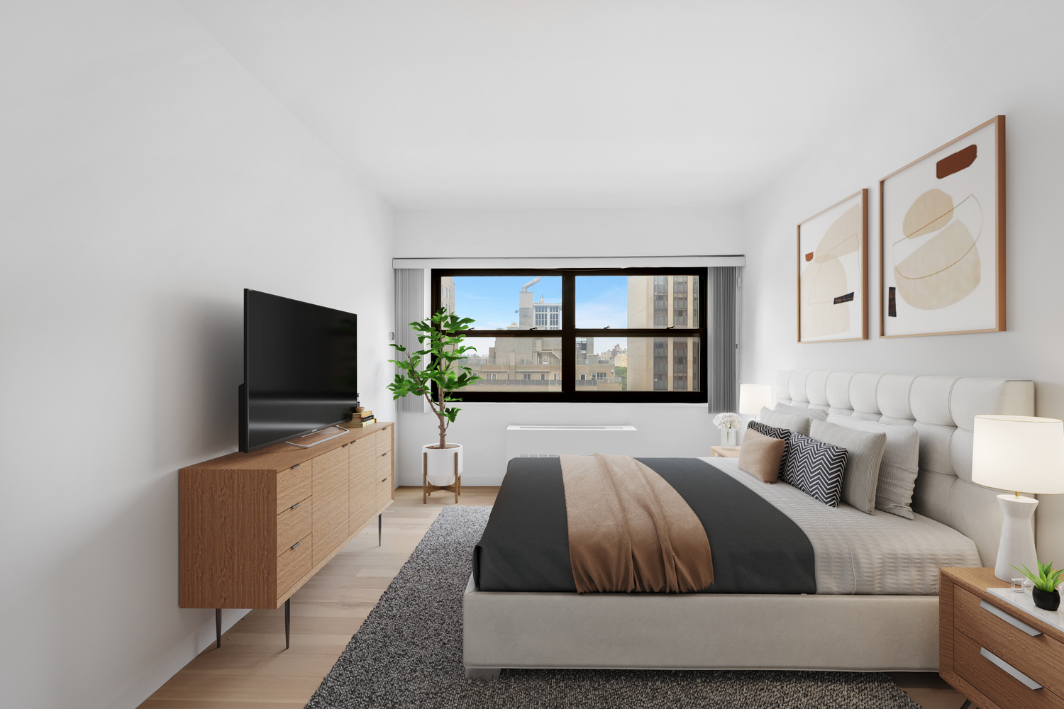 58 West 58th Street, Unit 21C Manhattan, NY 10019 - Photo 9 of 12 a bedroom with a large bed and a flat screen tv