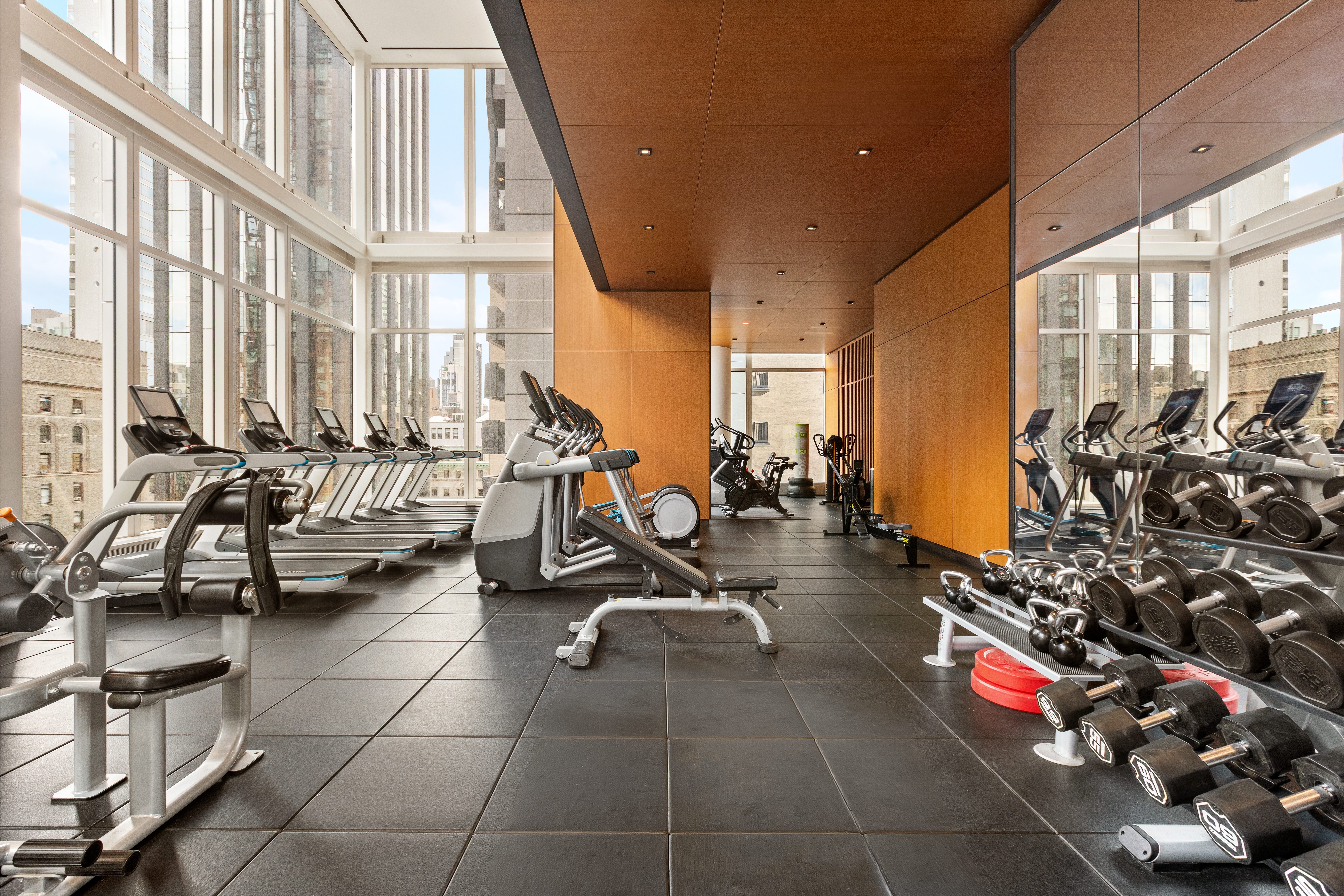 15 East 30th Street, Unit 26C Manhattan, NY 10016 - Photo 10 of 15 a gym room with lots of gym equipment