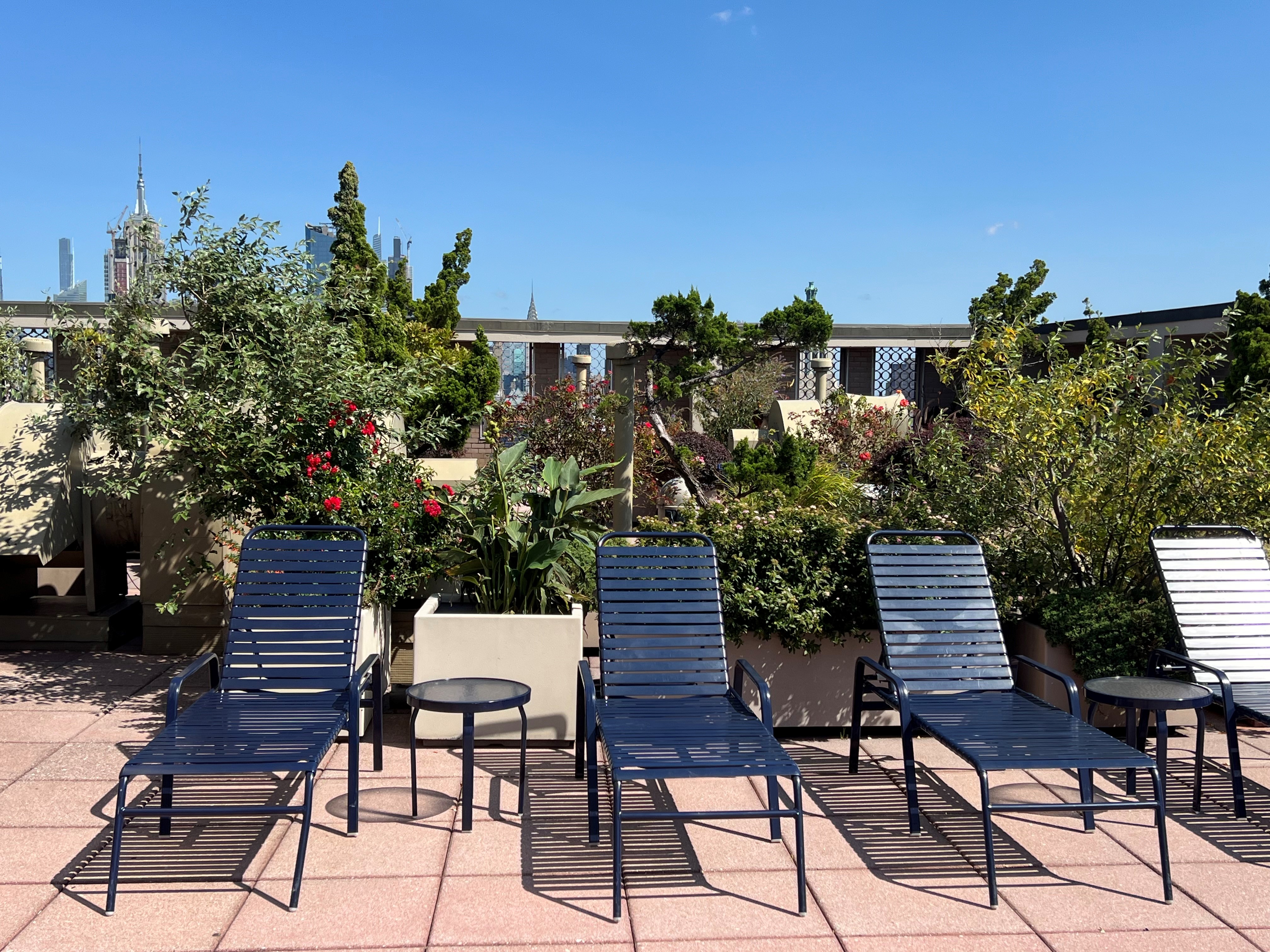 60 East 8th Street, Unit 23D Manhattan, NY 10003 - Photo 10 of 16 a view of a chairs and table in the patio