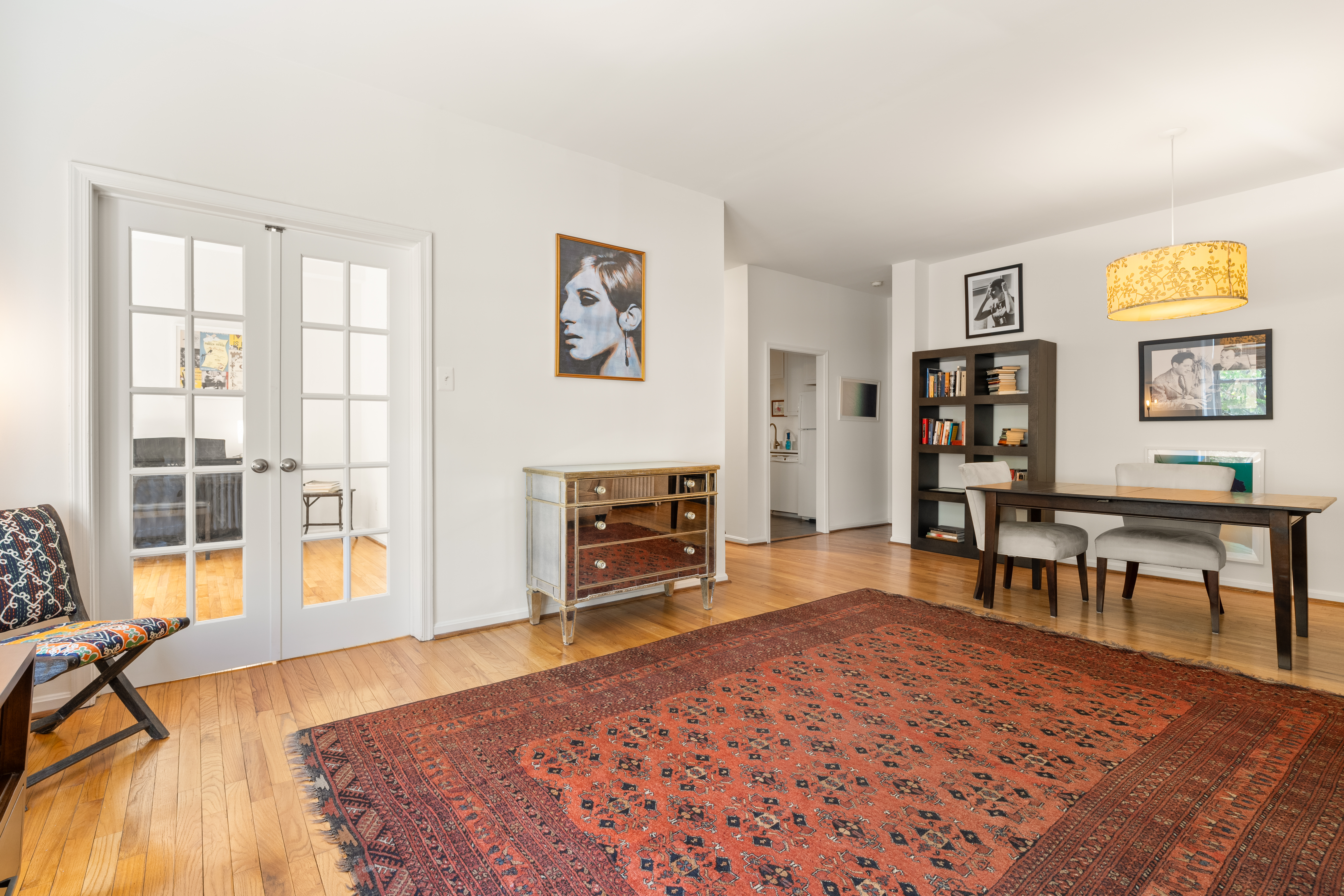 1855 Calvert Street Northwest, Unit 101 Washington, DC 20009 - Photo 3 of 14 a living room with fireplace furniture and a wooden floor