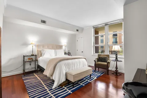 a bathroom with a bathtub and a toilet