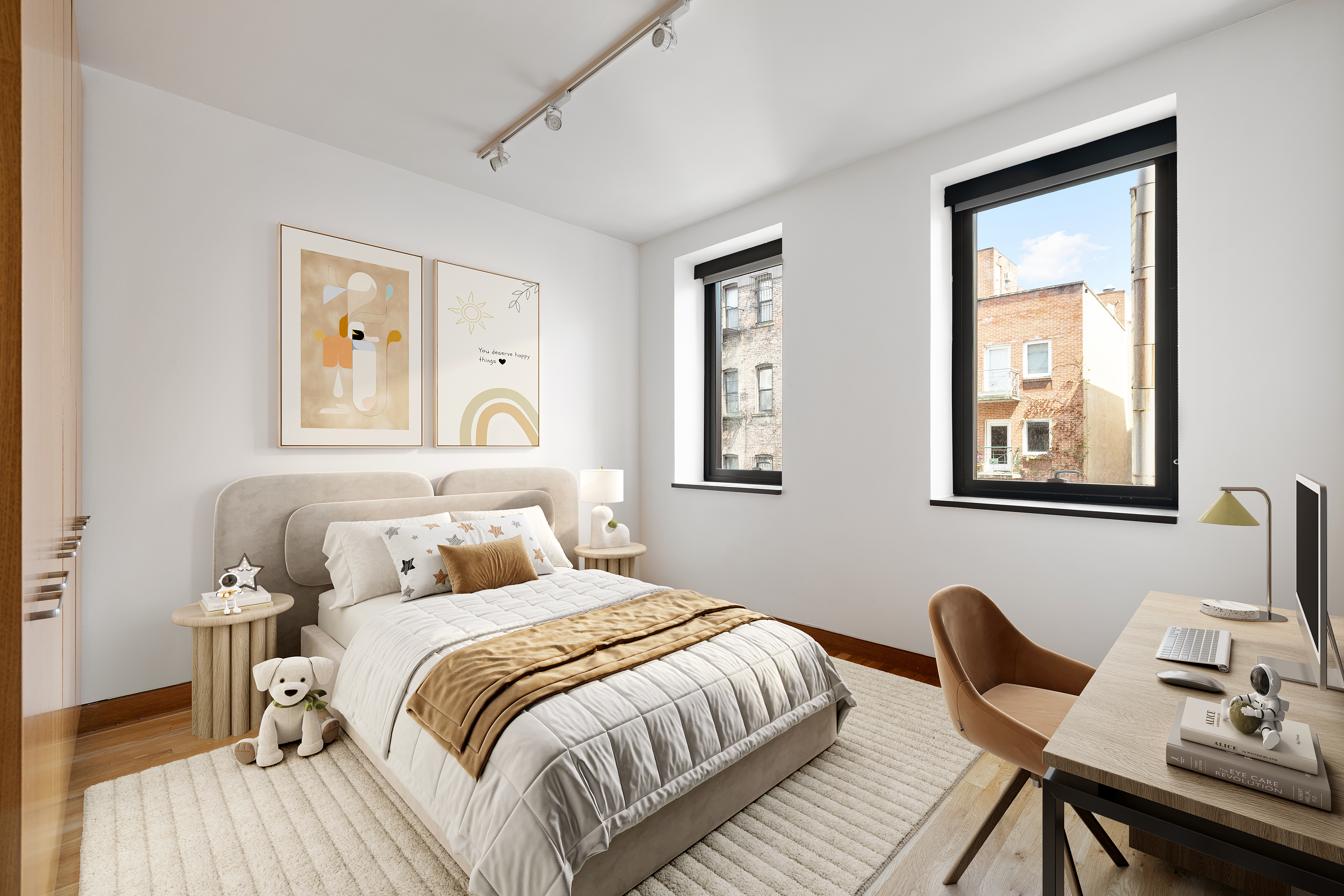 75 Sullivan Street, Unit 5S Manhattan, NY 10012 - Photo 6 of 12 a bedroom with a bed and wooden floor