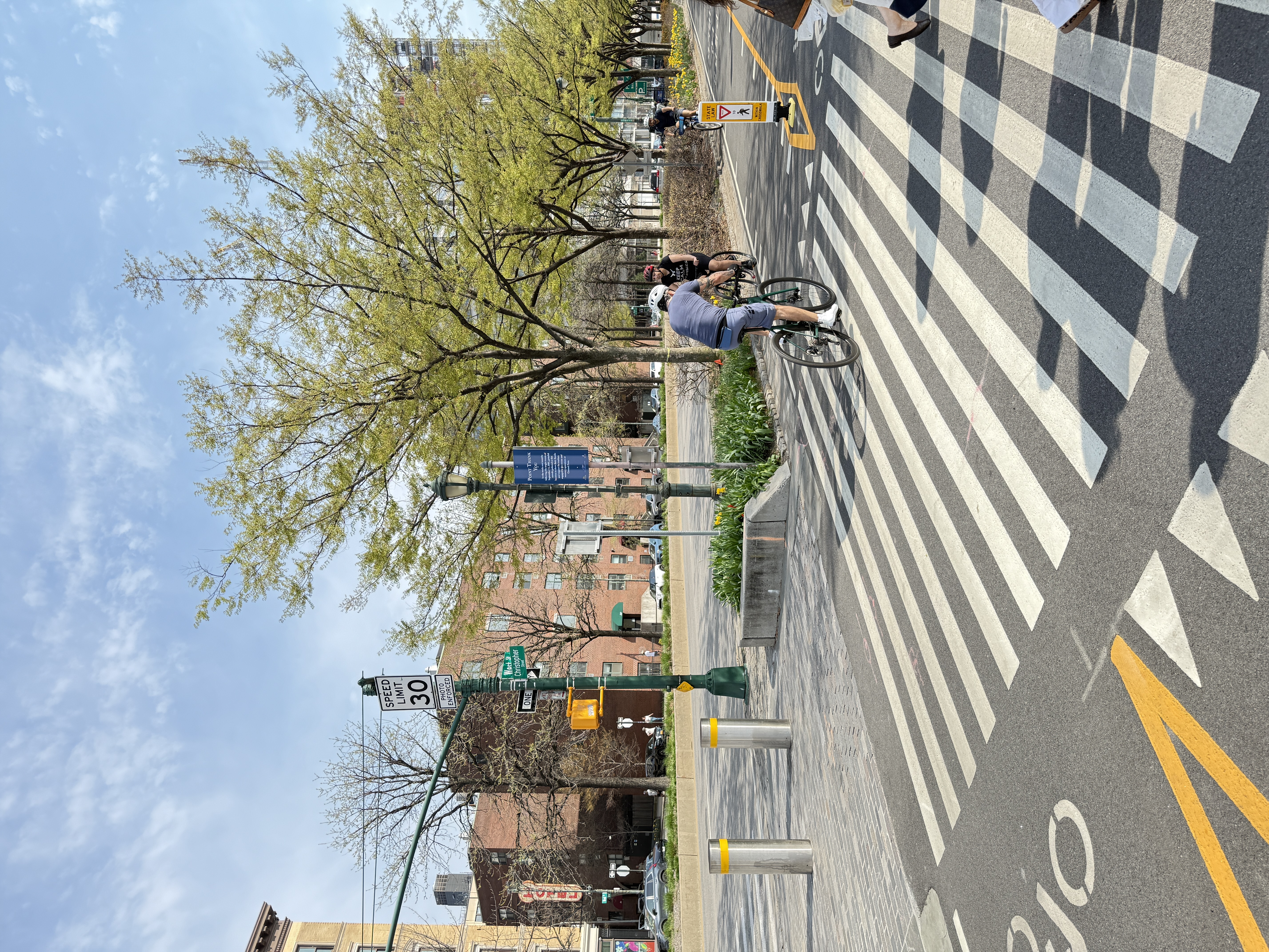 376 West Street, Unit 1A Manhattan, NY 10014 - Photo 8 of 11 a view of a yard with cars on road