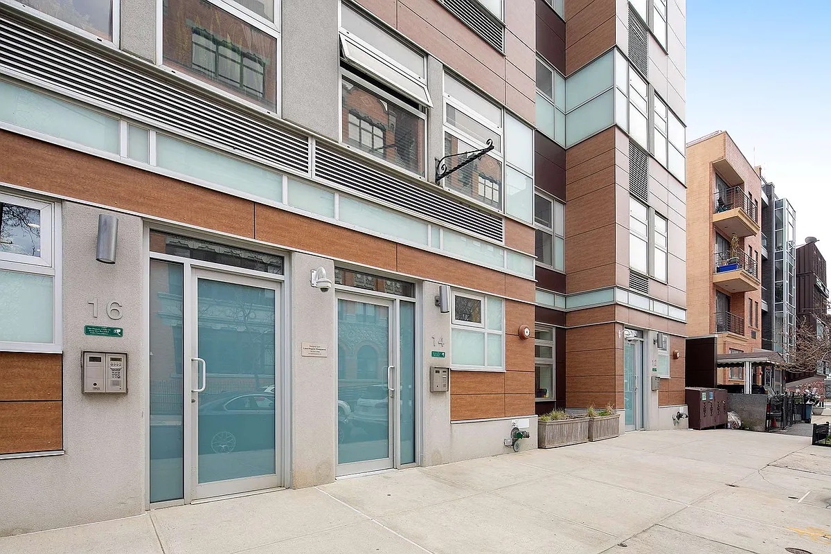 a view of a building with a street