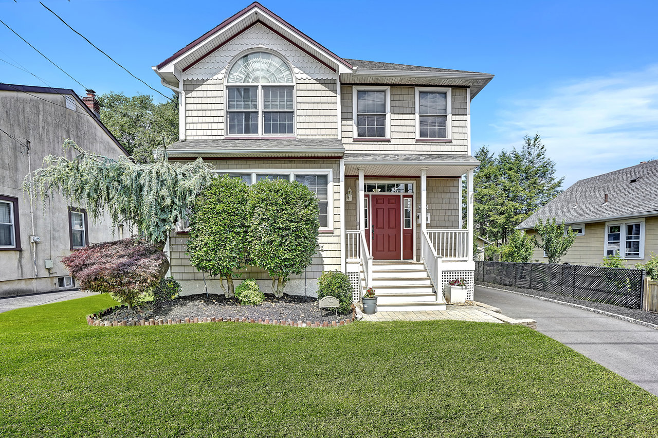 266 Feronia Way Rutherford, NJ 07070 - Photo 2 of 41 a front view of a house with a yard