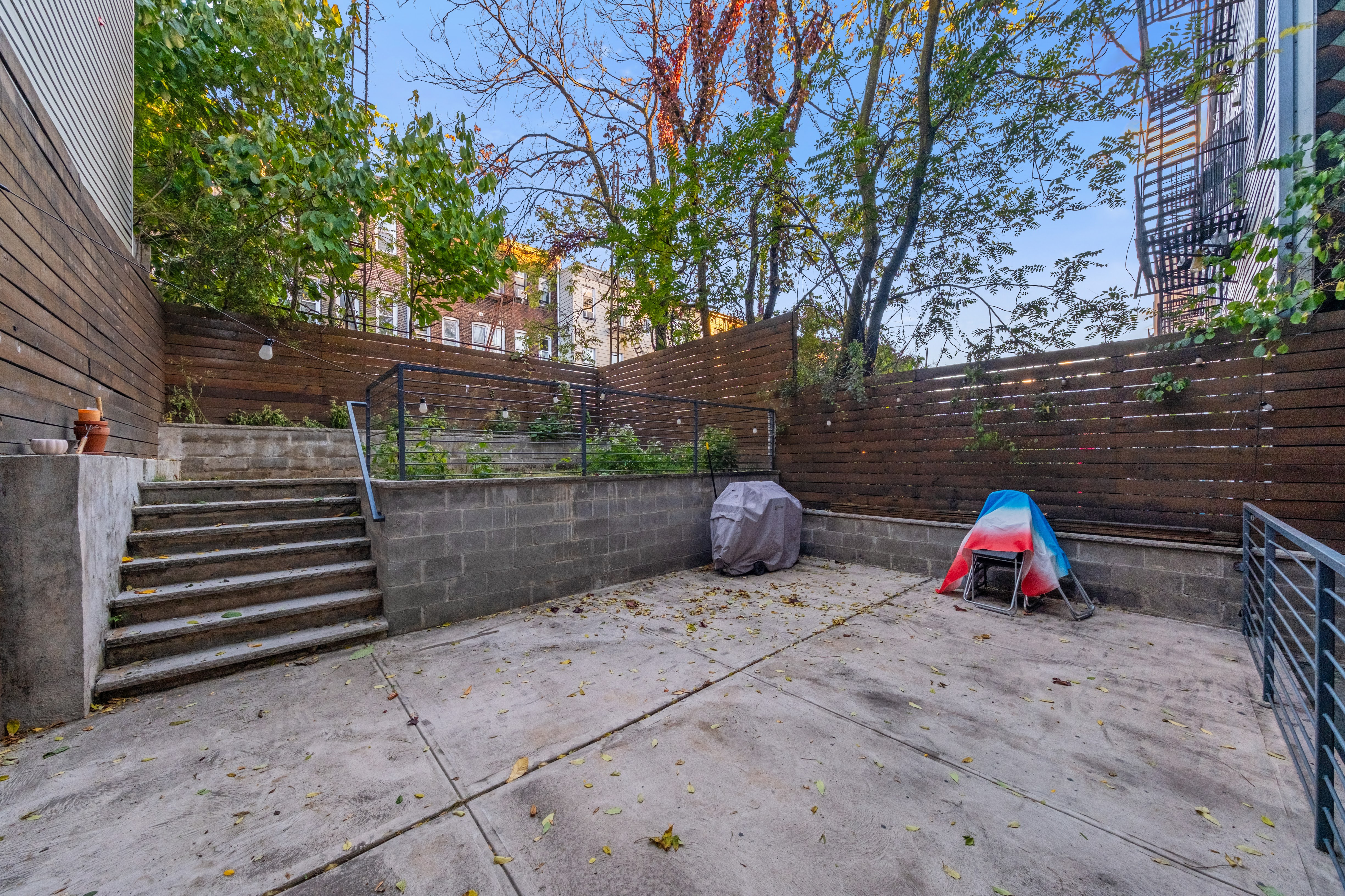 394 Harman Street, Unit 1B Brooklyn, NY 11237 - Photo 17 of 23 a view of outdoor space and deck area