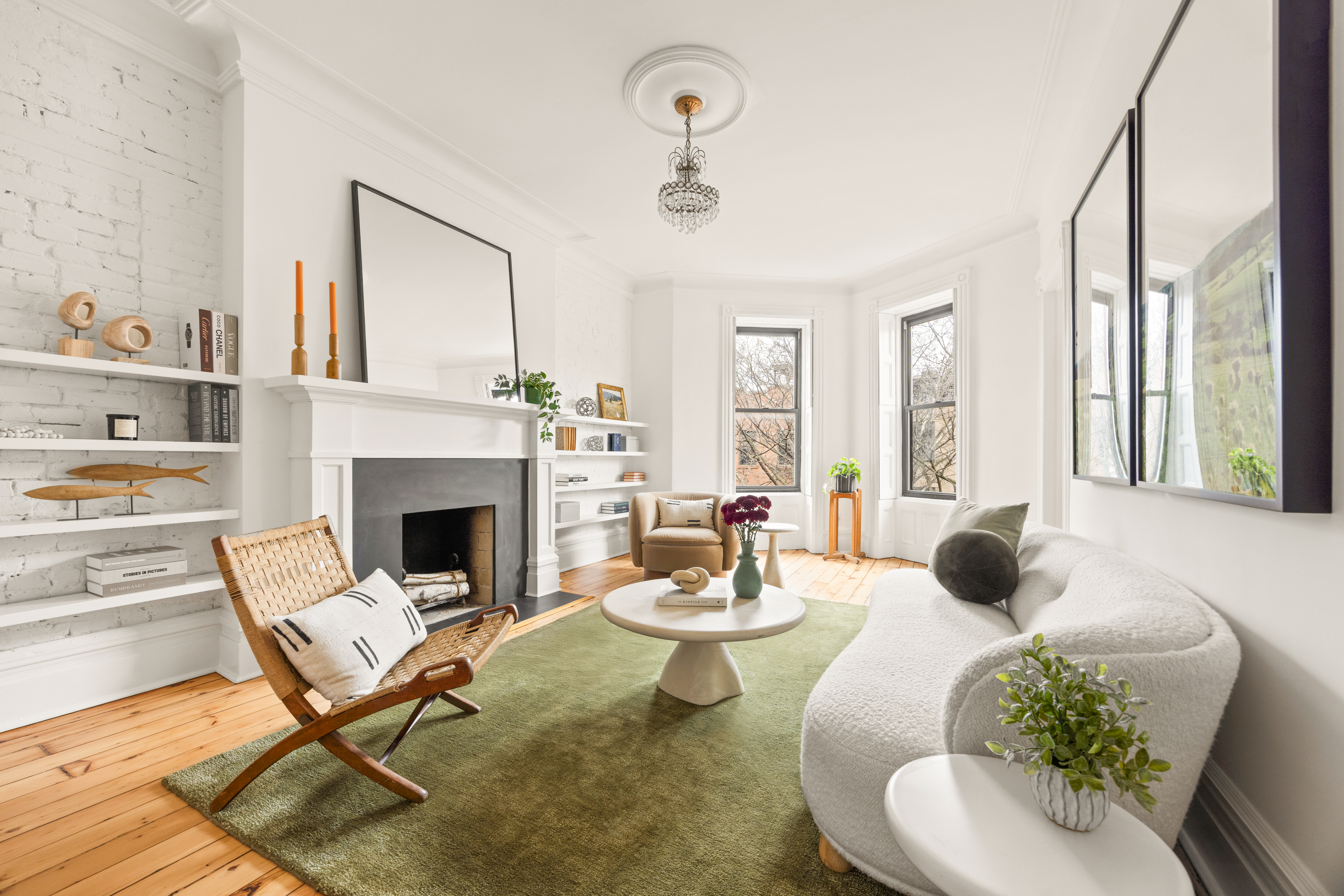 680 Carroll Street, Unit 4 Brooklyn, NY 11215 - Photo 3 of 17 a living room with furniture and a fireplace
