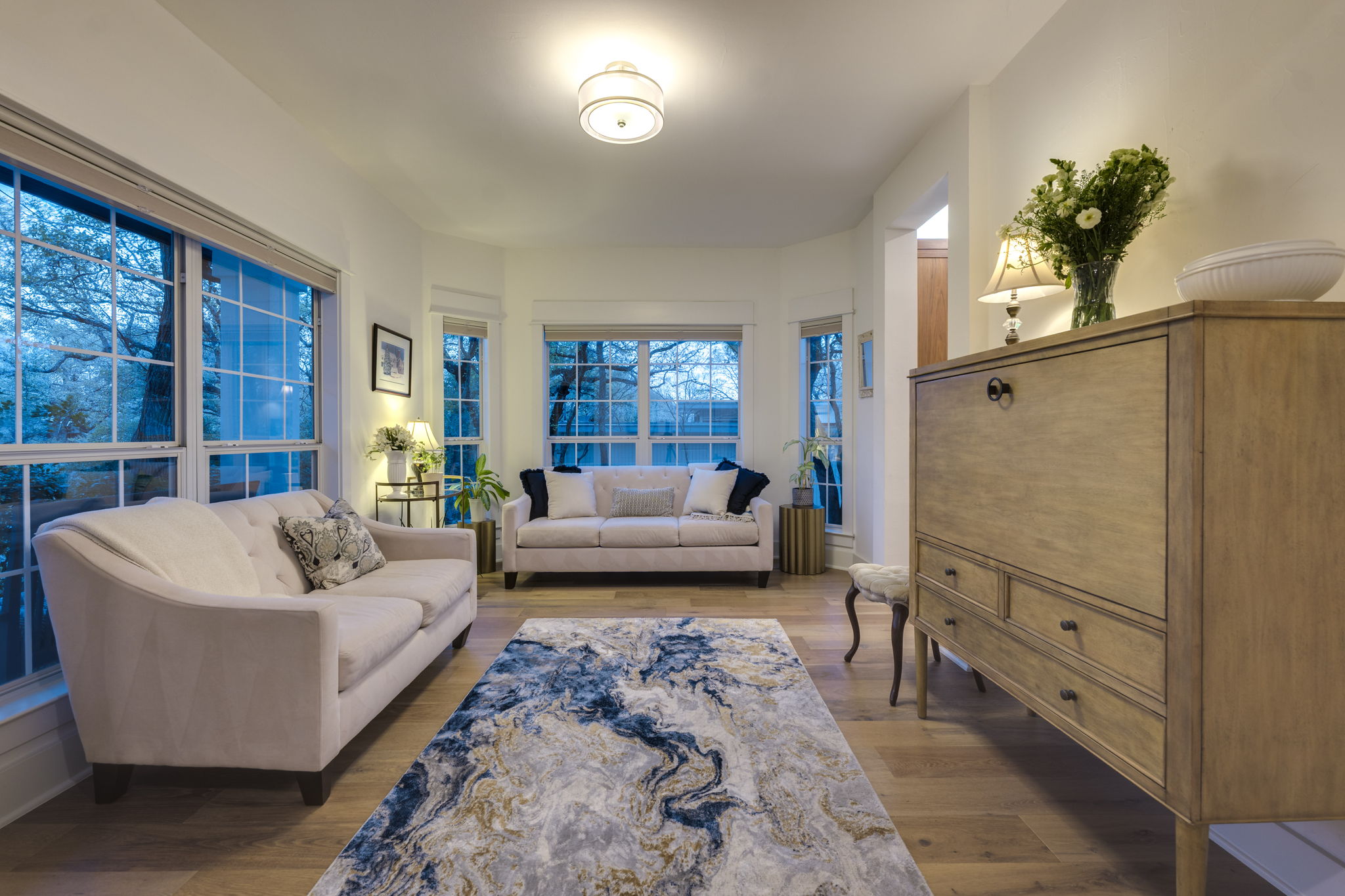 109 West Spring Drive Austin, TX 78746 - Photo 14 of 22 a living room with furniture and a potted plant
