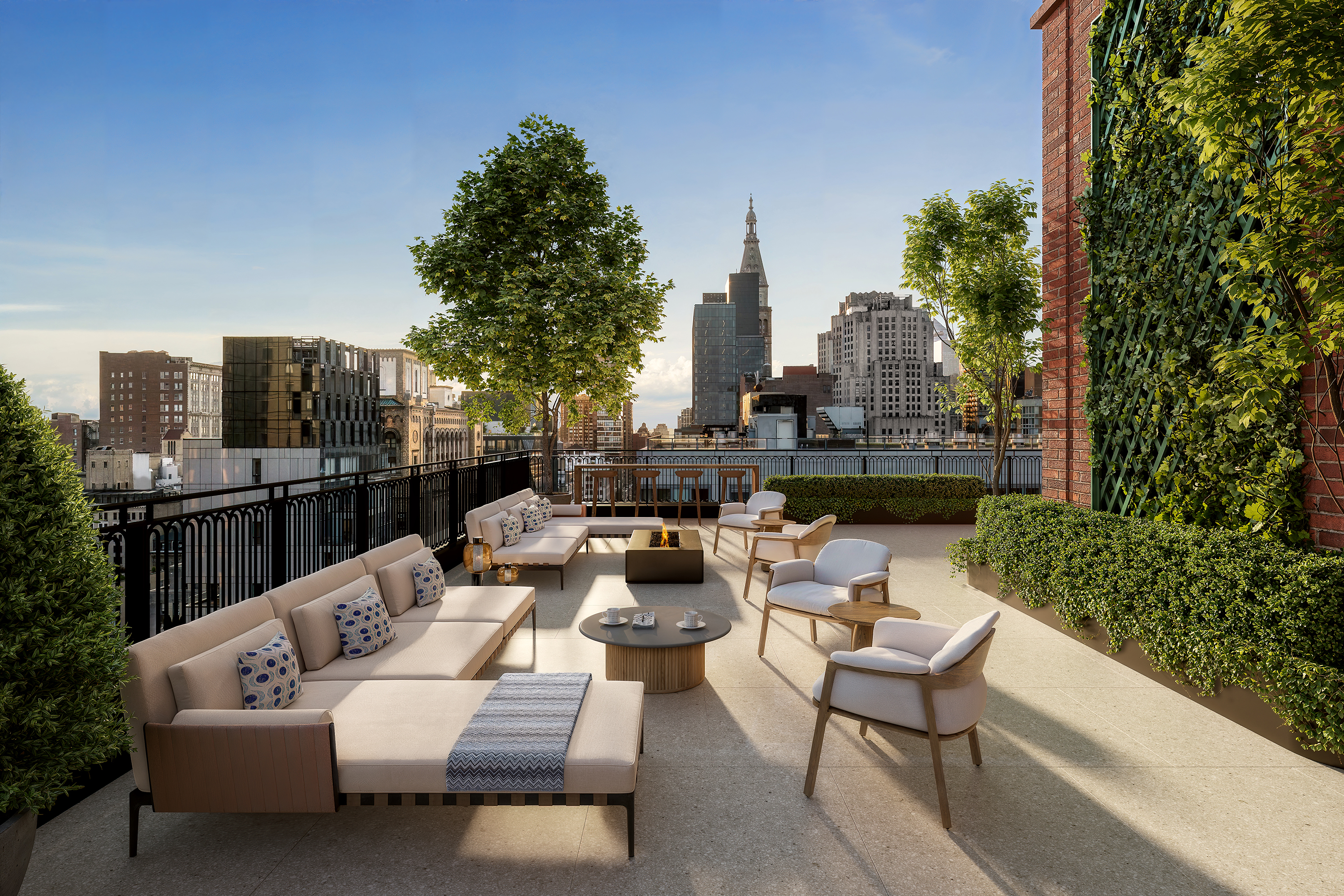 201 East 23rd Street, Unit PHE Manhattan, NY 10010 - Photo 13 of 21 a view of a patio with couches and a potted plant on a table and chairs