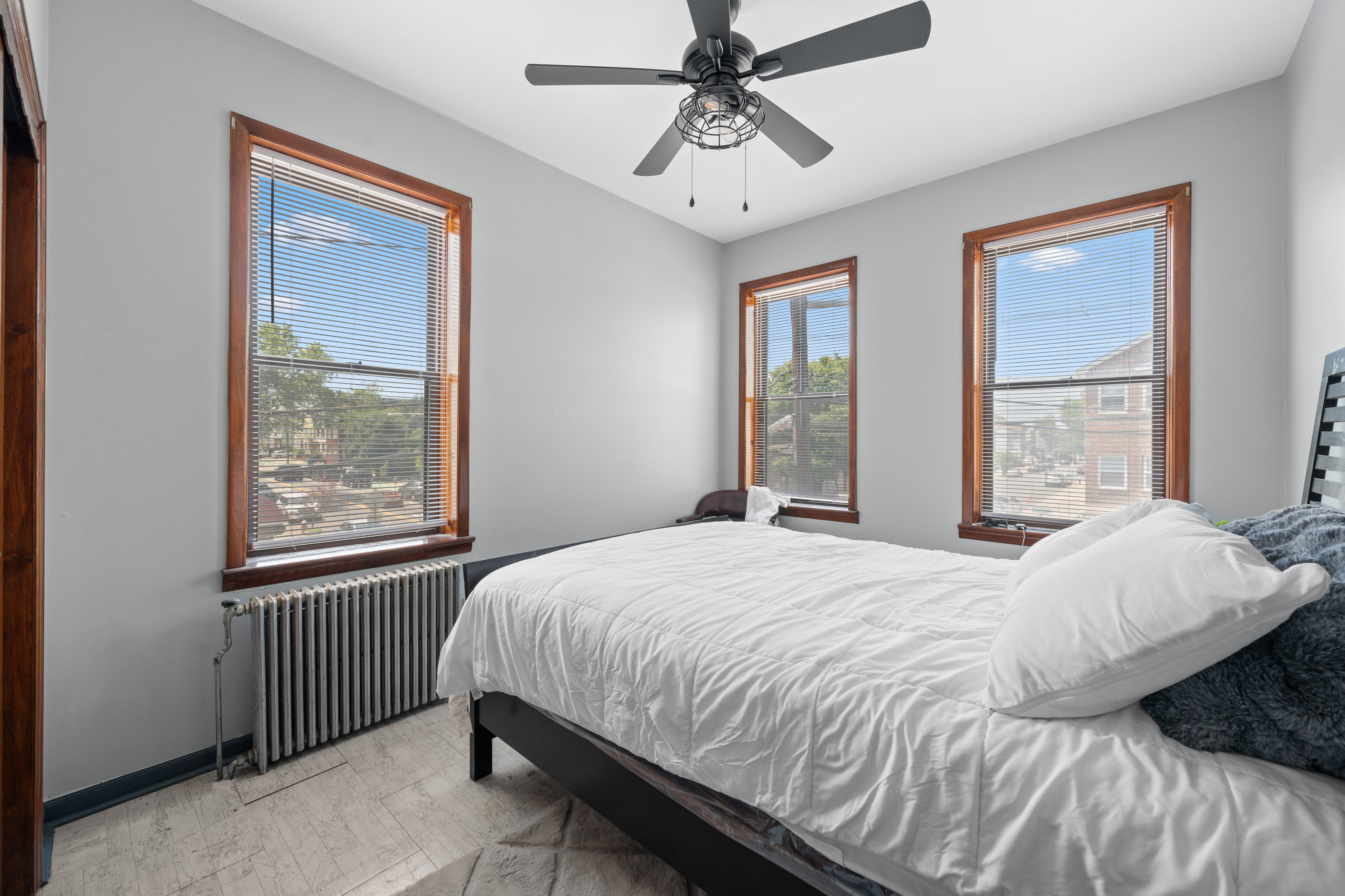 162 Mallory Avenue Jersey City, NJ 07304 - Photo 11 of 29 a bedroom with a bed dresser and a window