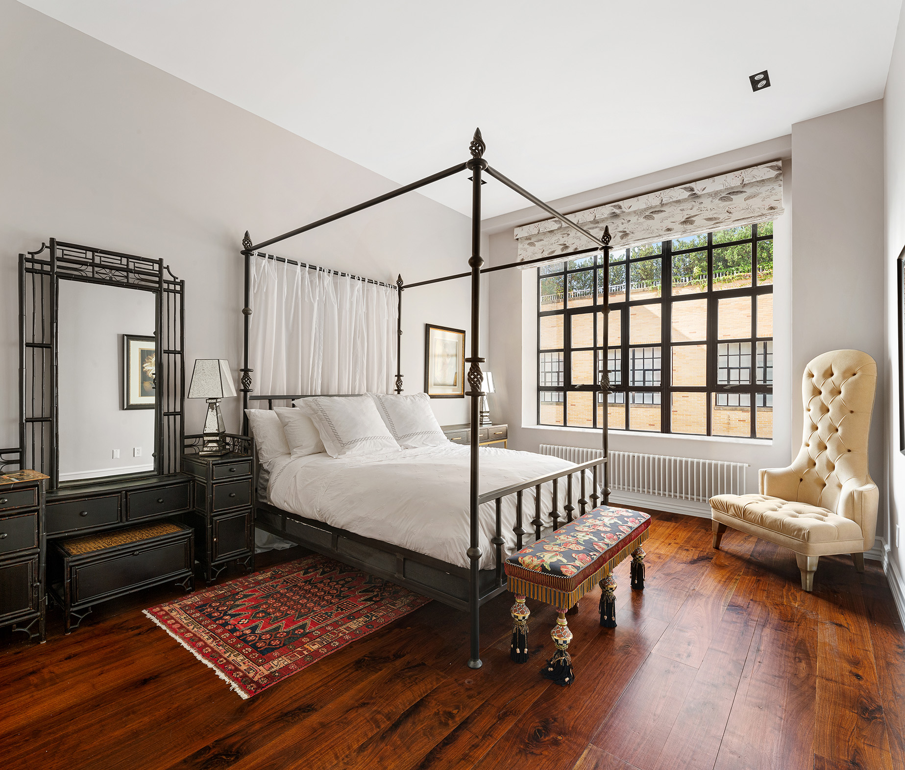 73 Wooster Street, Unit PHA Manhattan, NY 10012 - Photo 15 of 25 a bedroom with furniture and a window