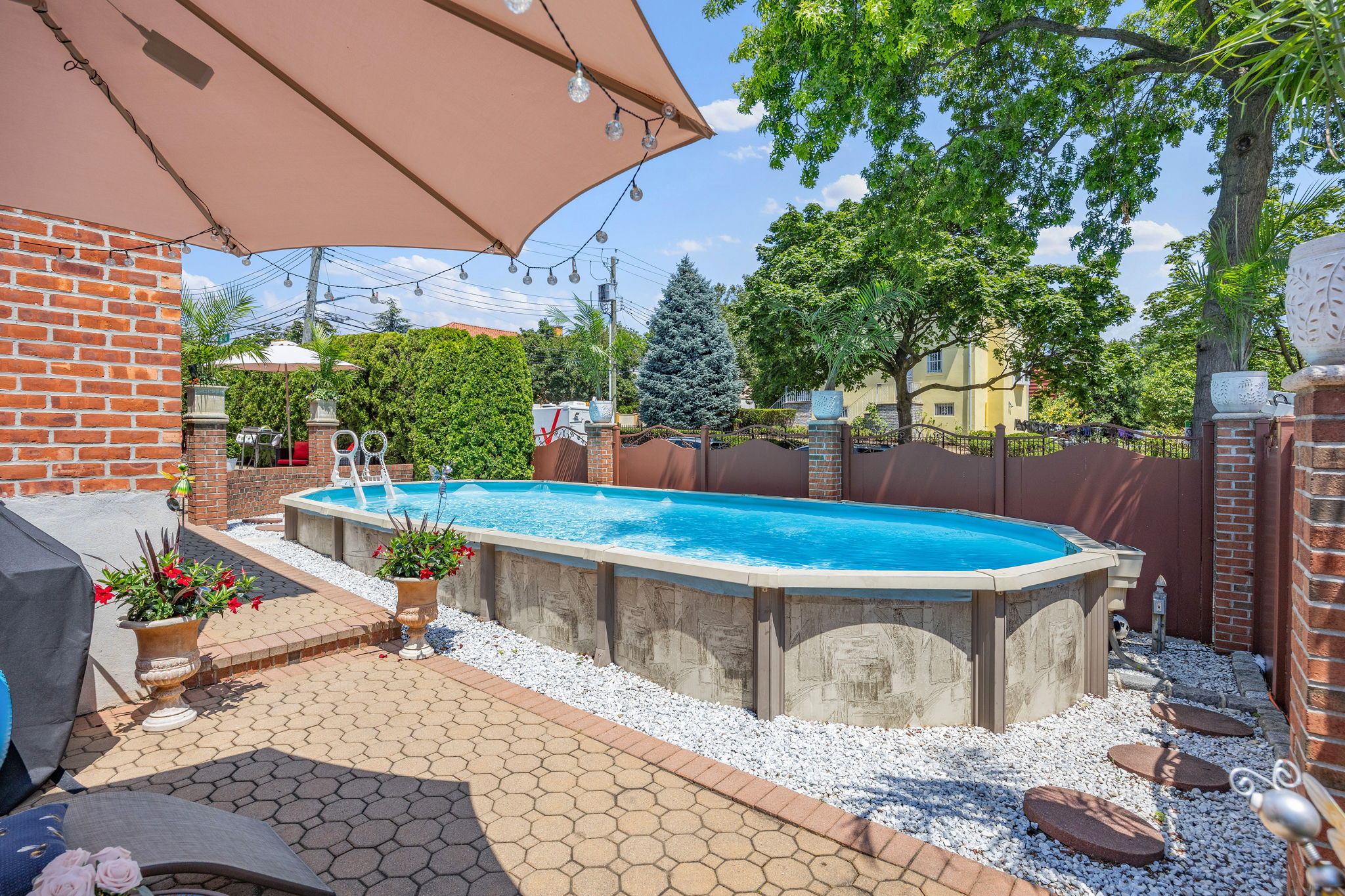 141-18 14th Avenue Queens, NY 11357 - Photo 19 of 26 a view of a swimming pool with a patio