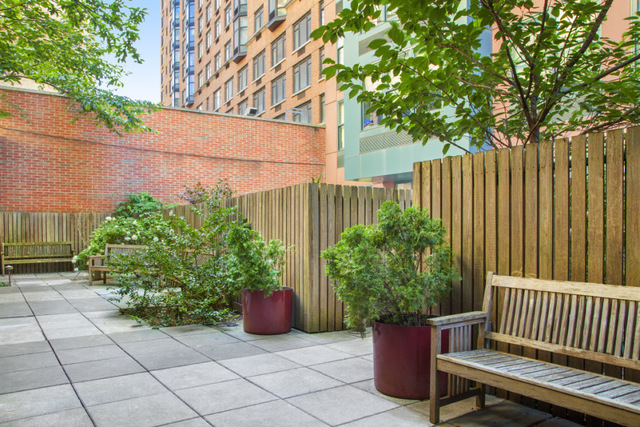 199 State Street, Unit 5C Brooklyn, NY 11201 - Photo 15 of 16 a view of a chair and table in the backyard