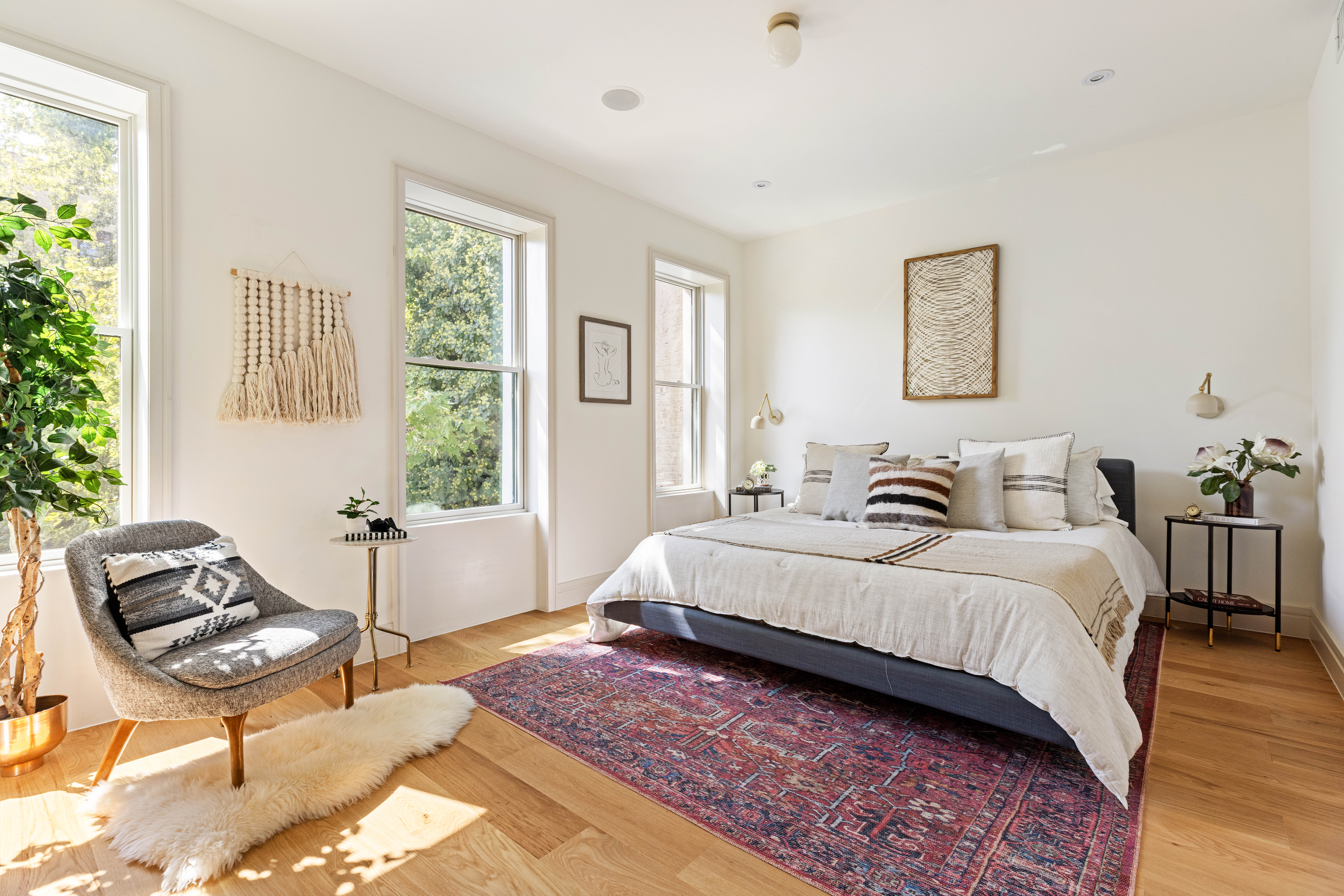 444 Quincy Street Brooklyn, NY 11221 - Photo 8 of 16 a spacious bedroom with a bed and wooden floor