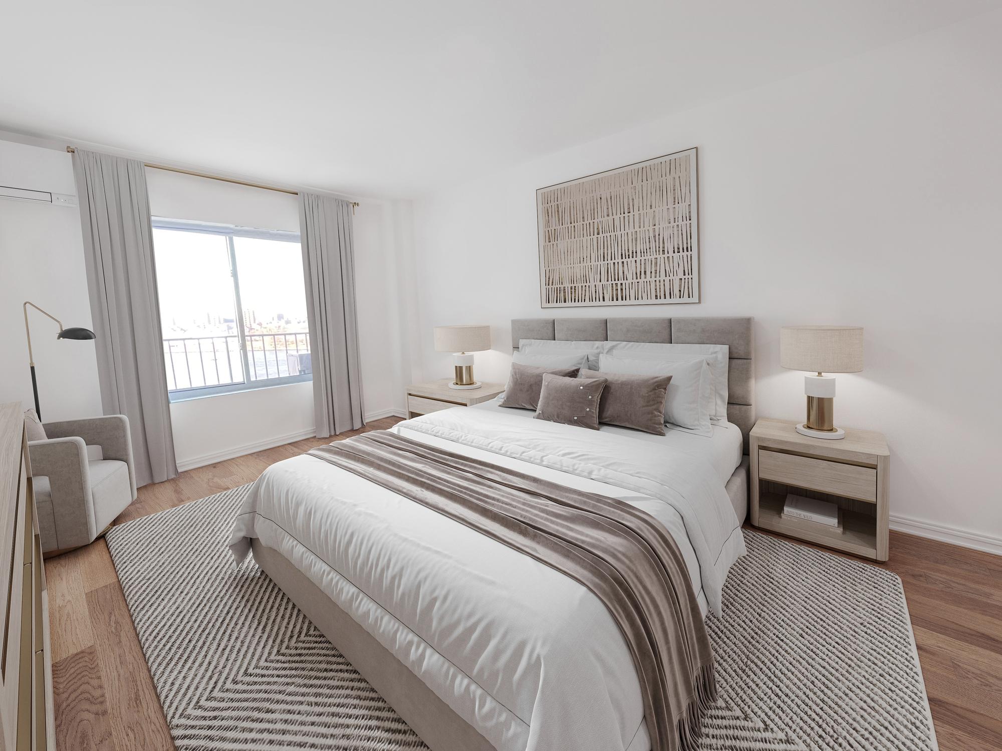 25-40 Shore Boulevard, Unit 15T Queens, NY 11102 - Photo 7 of 24 a bedroom with a bed and a window