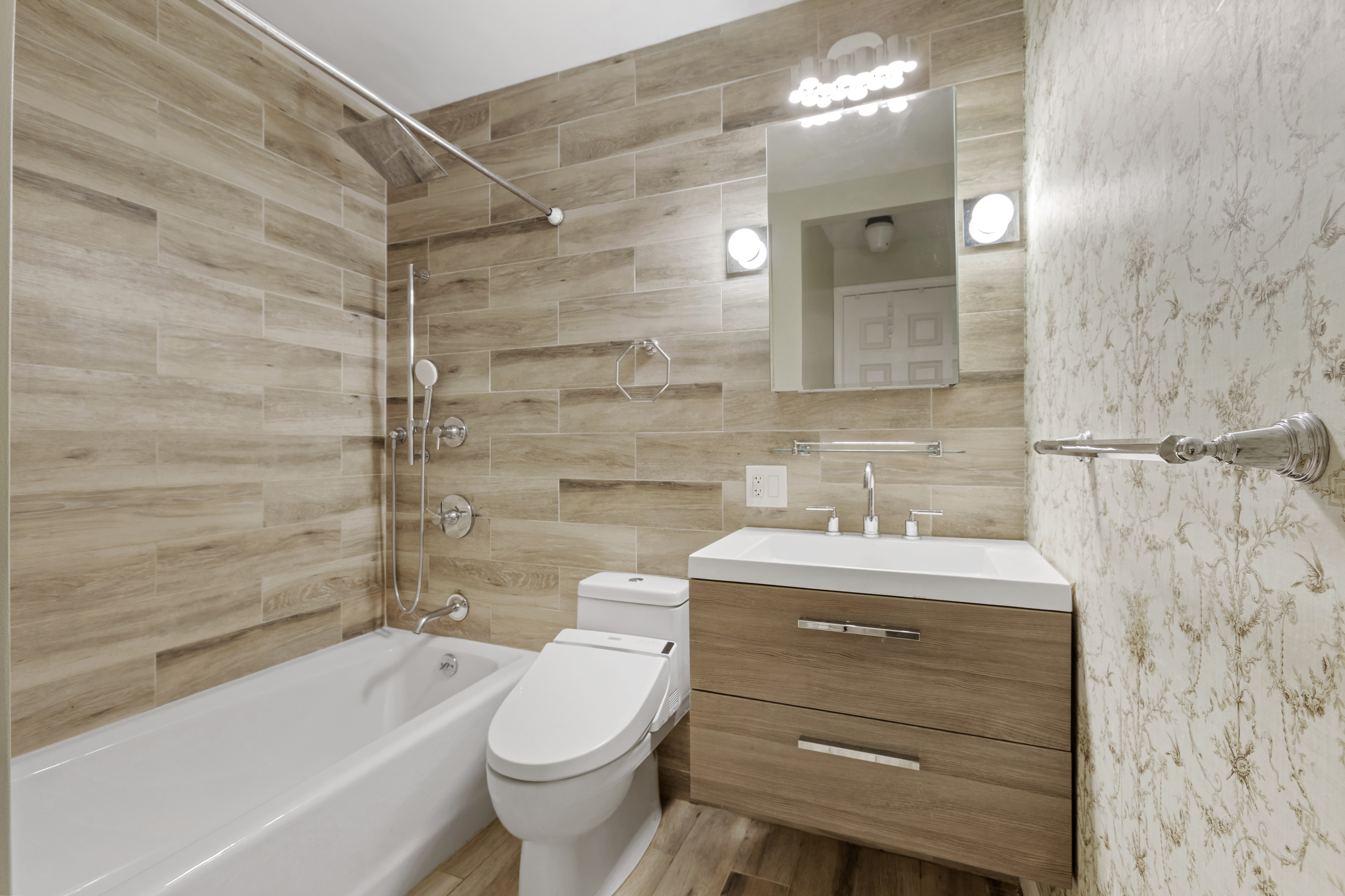 1 Irving Place, Unit U7BC Manhattan, NY 10003 - Photo 5 of 20 a bathroom with a sink toilet vanity and bathtub