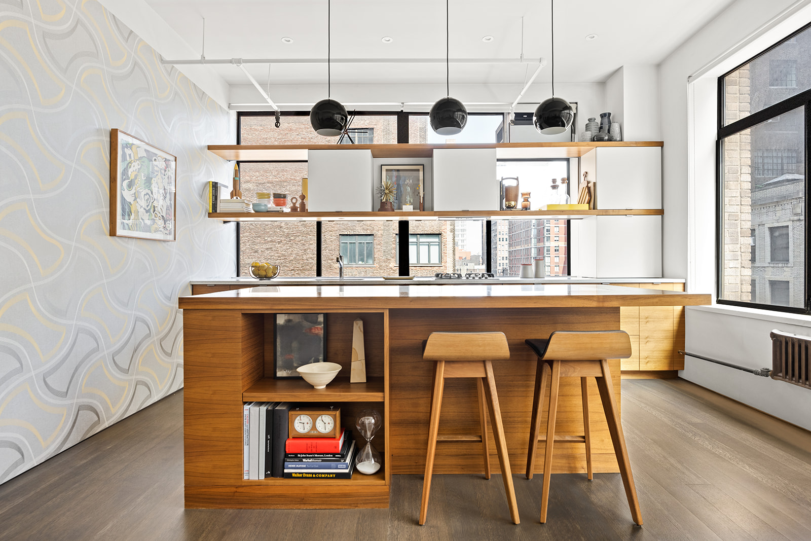 348 West 36th Street, Unit 6N Manhattan, NY 10018 - Photo 3 of 12 a dining table with chairs and window
