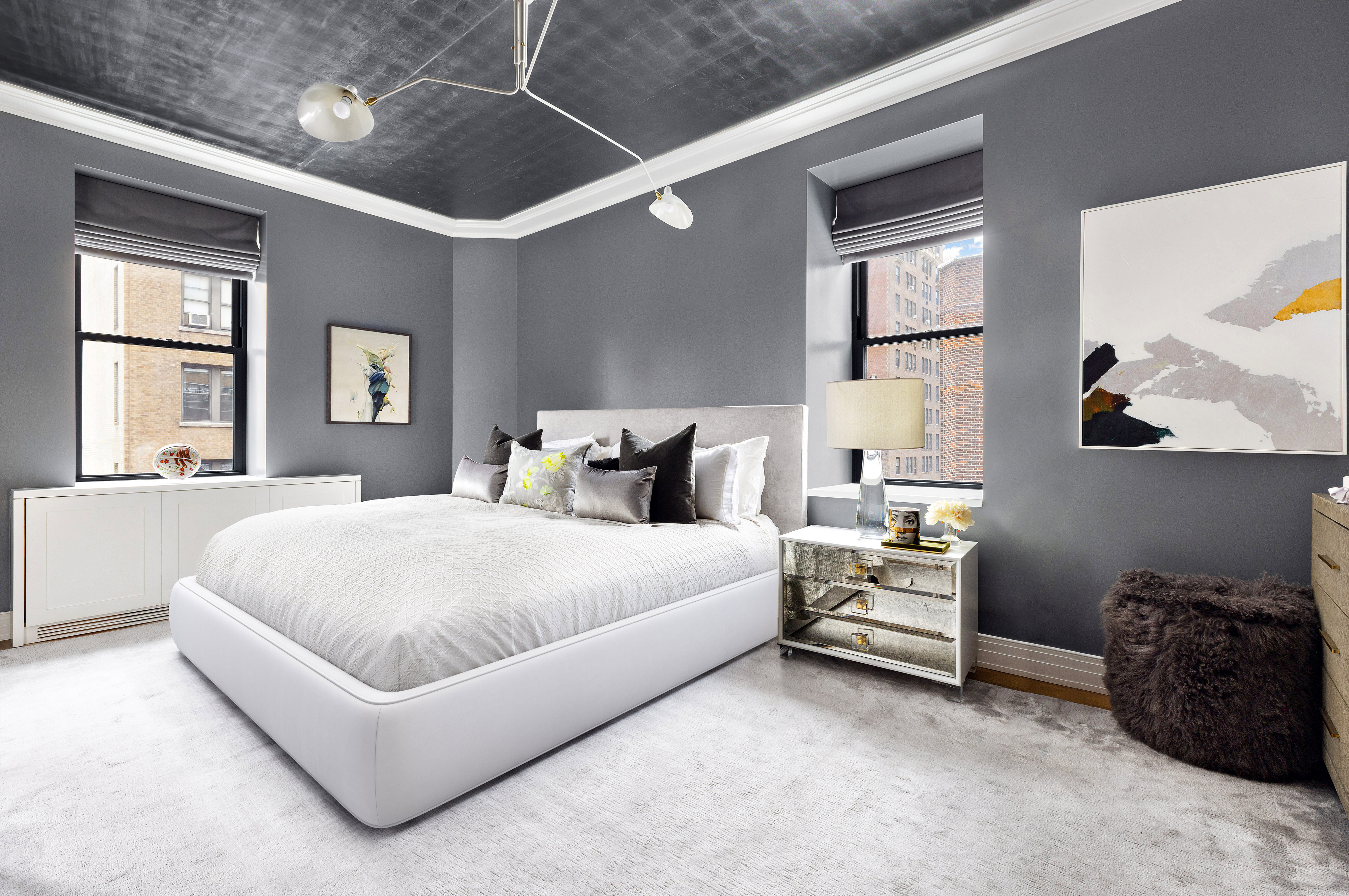 235 West 75th Street, Unit 505 Manhattan, NY 10023 - Photo 7 of 23 a spacious bedroom with a bed and a large window