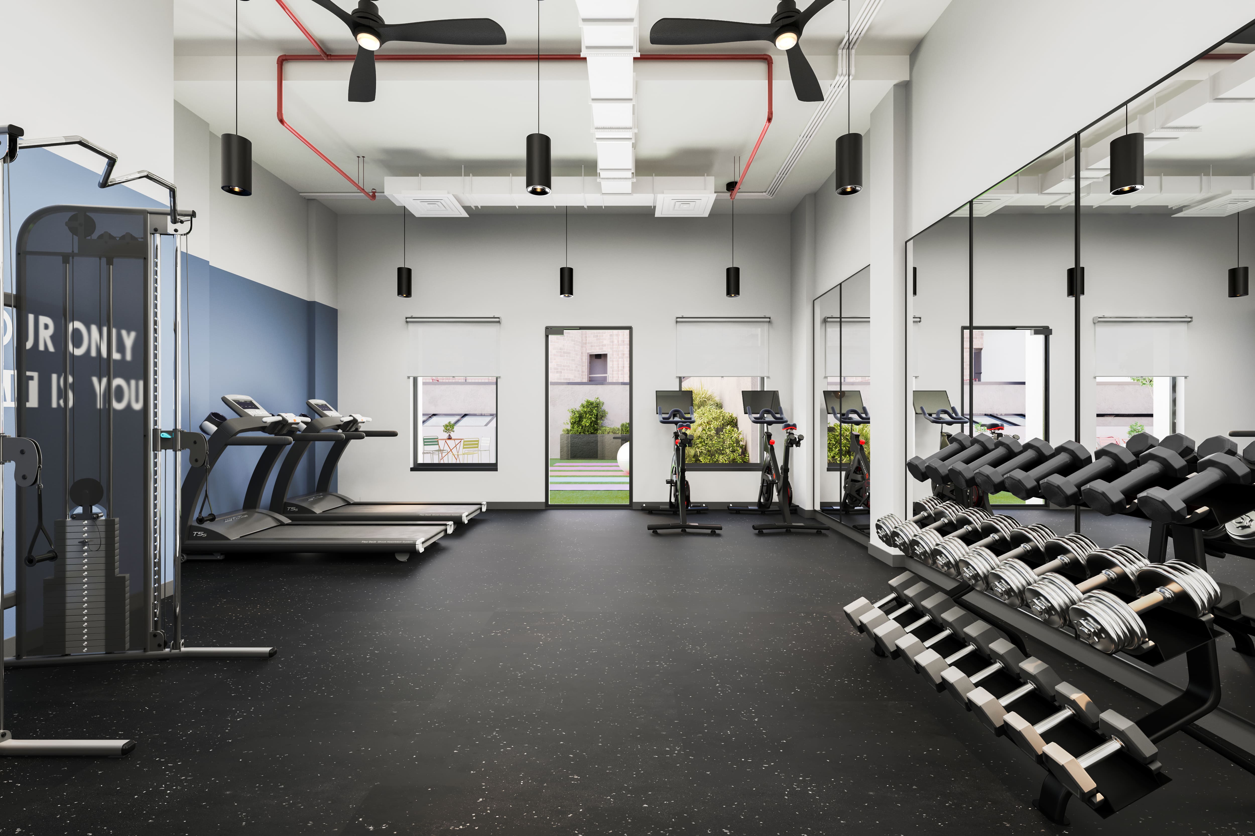 130 East 177th Street, Unit 10B Bronx, NY 10453 - Photo 15 of 18 a gym room with lots of gym equipment