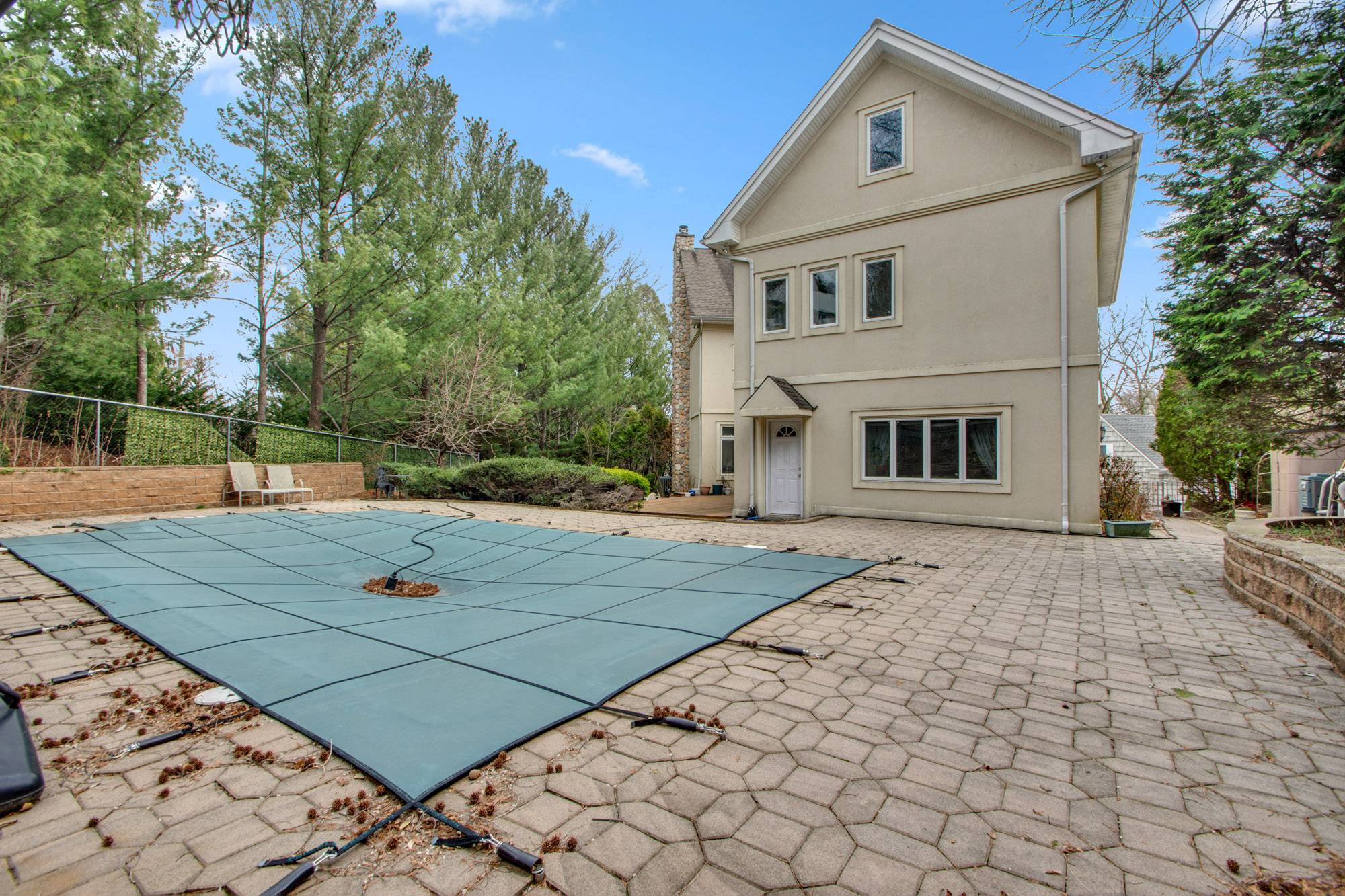 68 Circle Road Staten Island, NY 10304 - Photo 32 of 38 a view of a white house with a yard