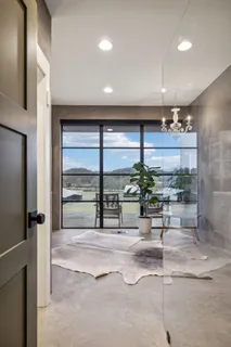 a lobby with furniture and a large window