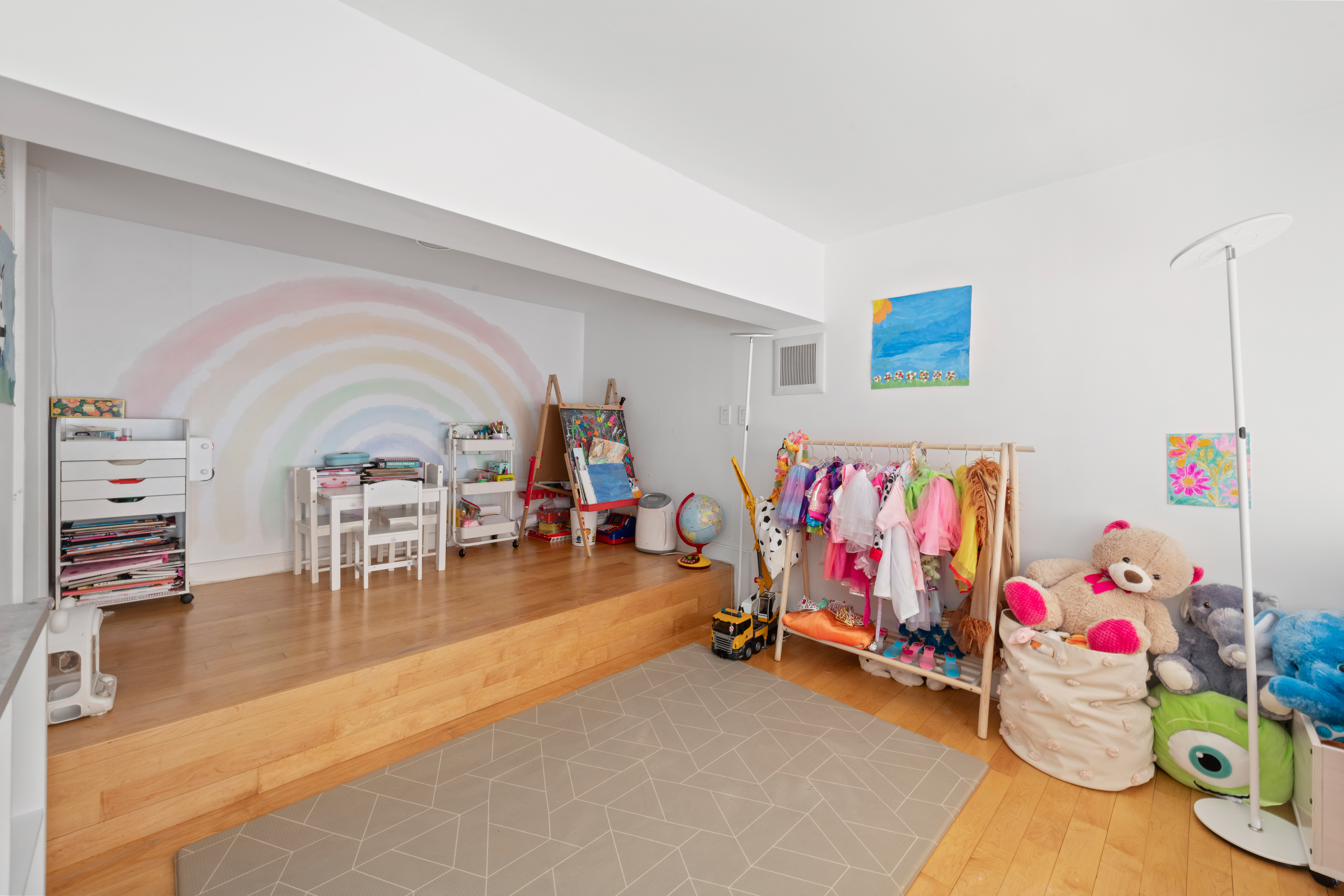 120 East 87th Street, Unit R16G Manhattan, NY 10128 - Photo 14 of 20 a living room with furniture and a table