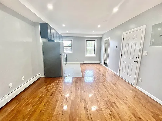 149 17th Street, Unit 3 Brooklyn, NY 11215 - Photo 2 of 7 a view of a livingroom with wooden floor