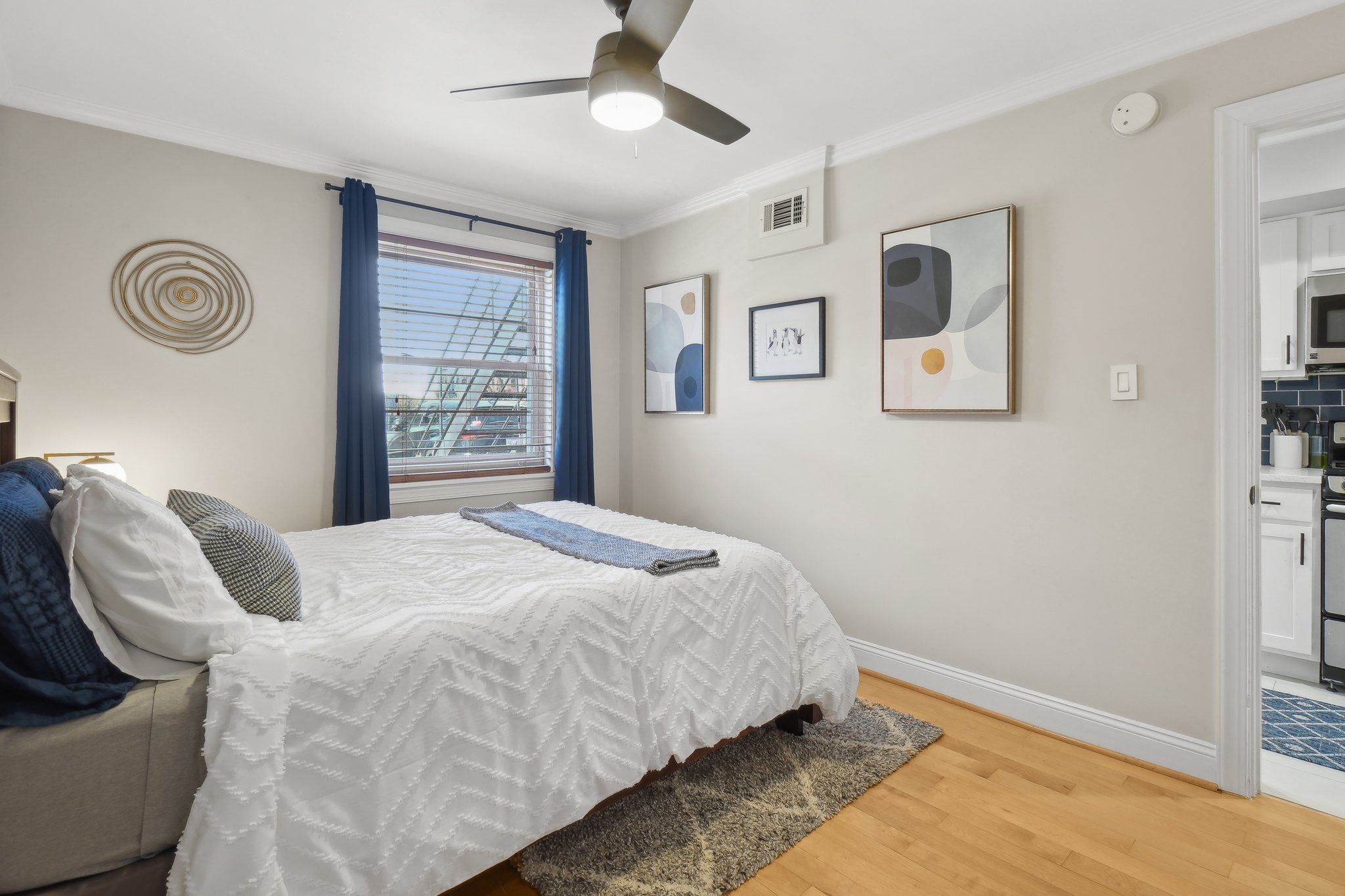 123 17th Street Southeast Washington, DC 20003 - Photo 12 of 18 a bedroom with a bed and a window
