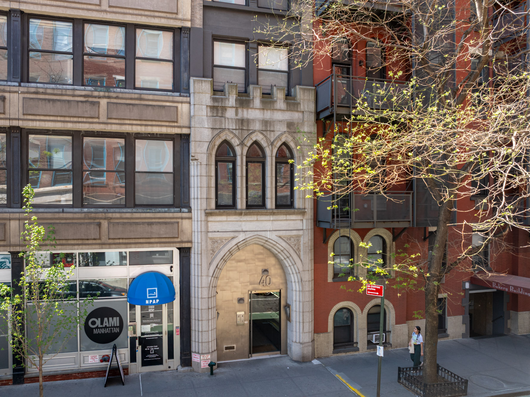 40 West 13th Street, Unit 2 Manhattan, NY 10011 - Photo 13 of 14 a front view of a building with many windows