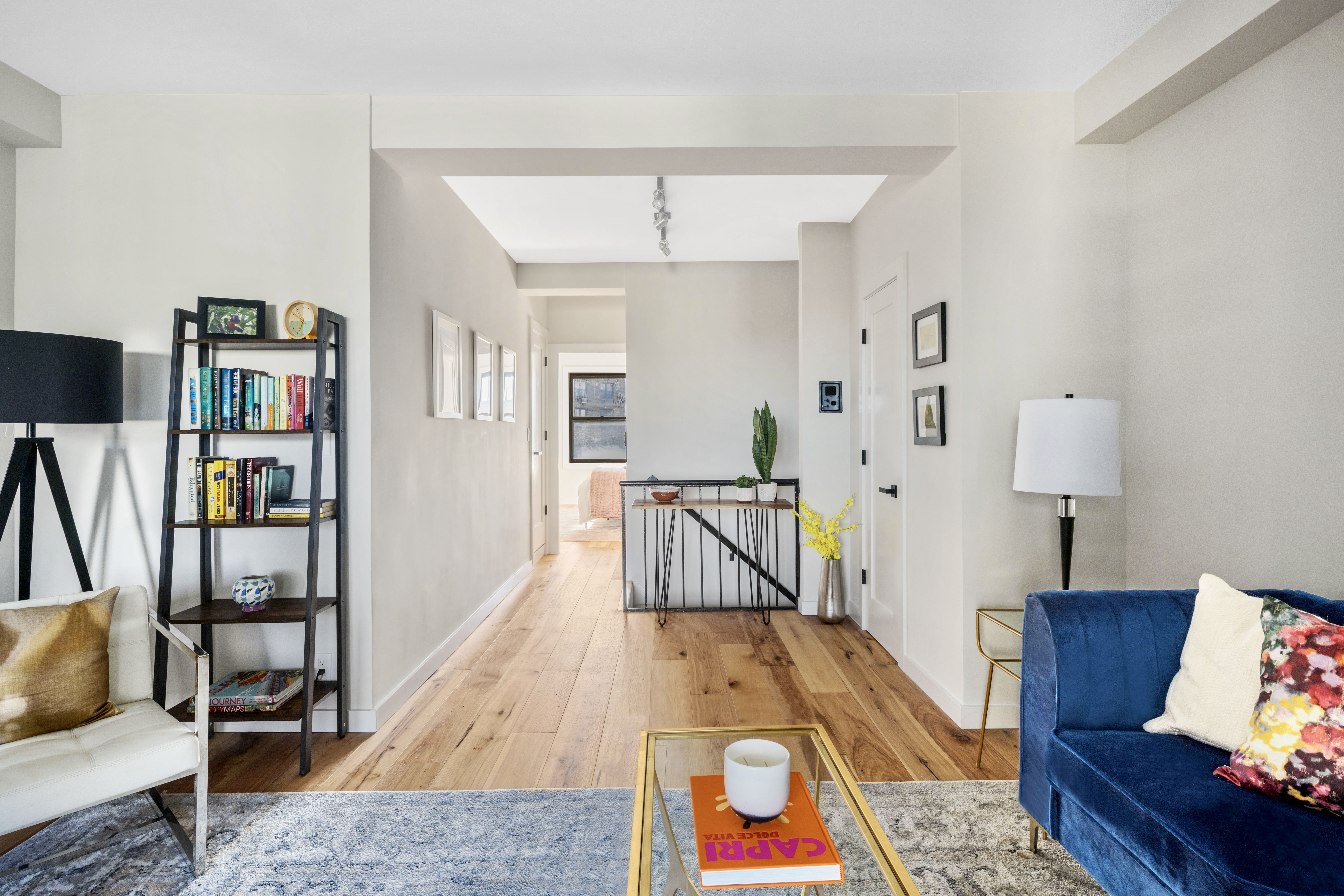 99-72 66th Road, Unit 3R Queens, NY 11374 - Photo 4 of 10 a living room with furniture and wooden floor