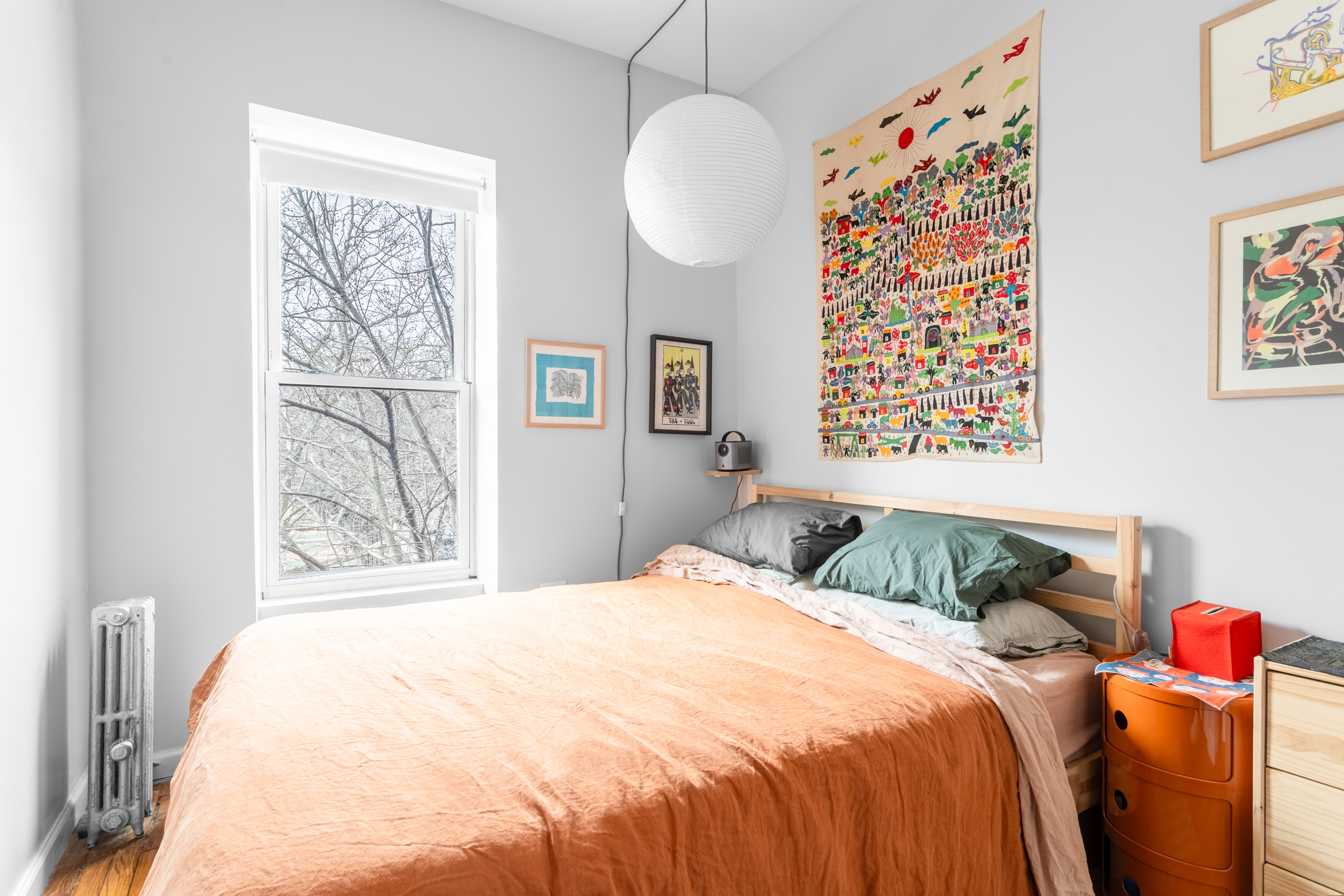 258 Halsey Street, Unit 3 Brooklyn, NY 11216 - Photo 6 of 10 a bedroom with a bed and a window