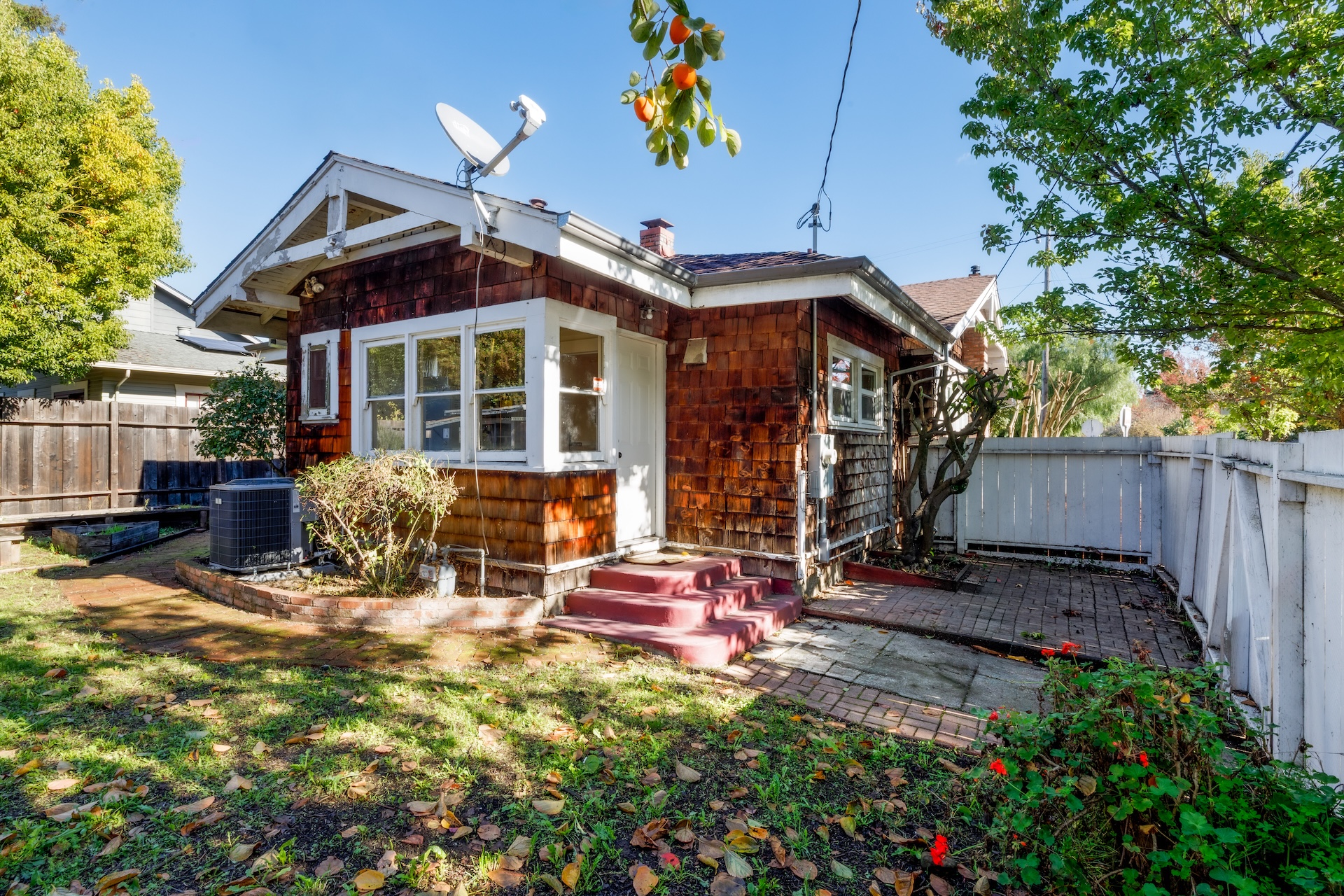 1203 Glenn Street Santa Rosa, CA 95401 - Photo 12 of 26 a view of a chair and tables in the back yard of the house