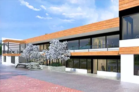 a large parking space in front of a house