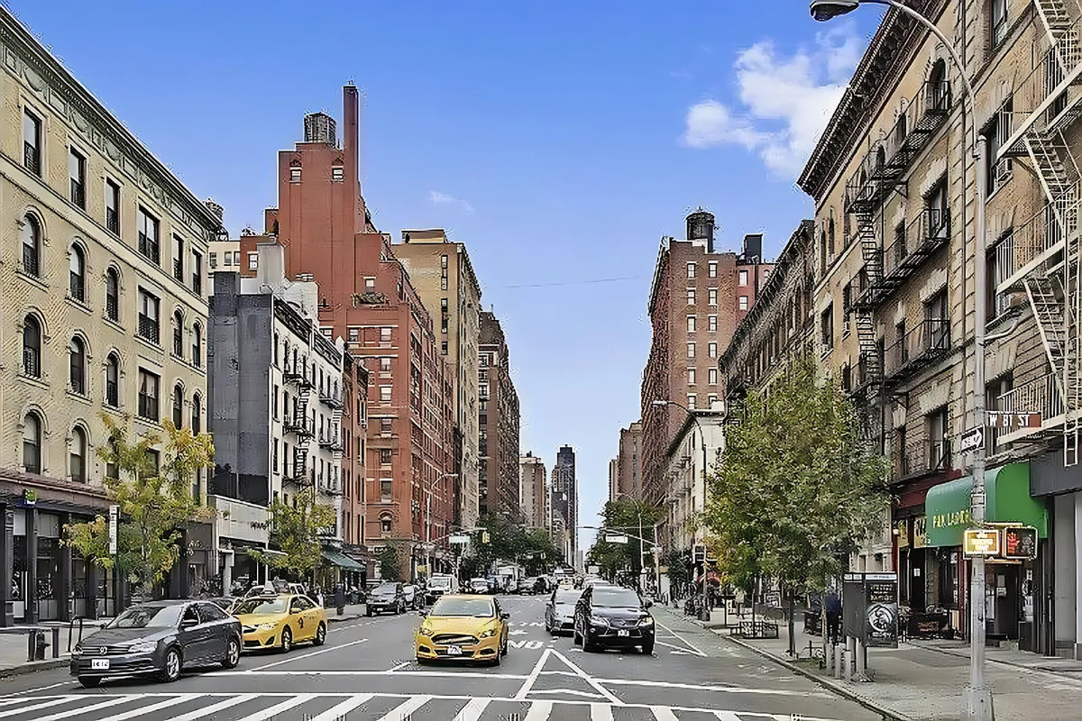 422 Amsterdam Avenue, Unit 2C Manhattan, NY 10024 - Photo 8 of 8 a city street lined with buildings and cars