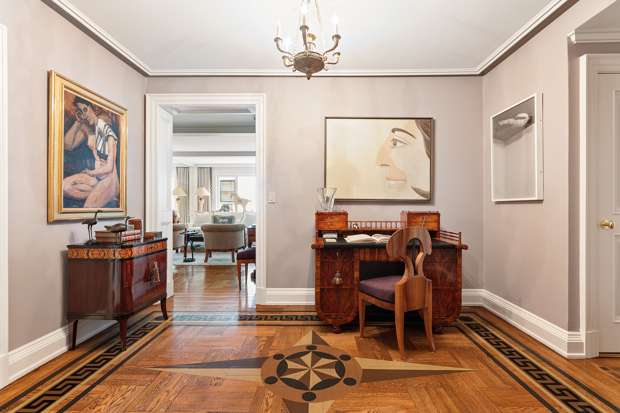 930 5th Avenue, Unit 11D Manhattan, NY 10021 - Photo 4 of 11 a living room with furniture