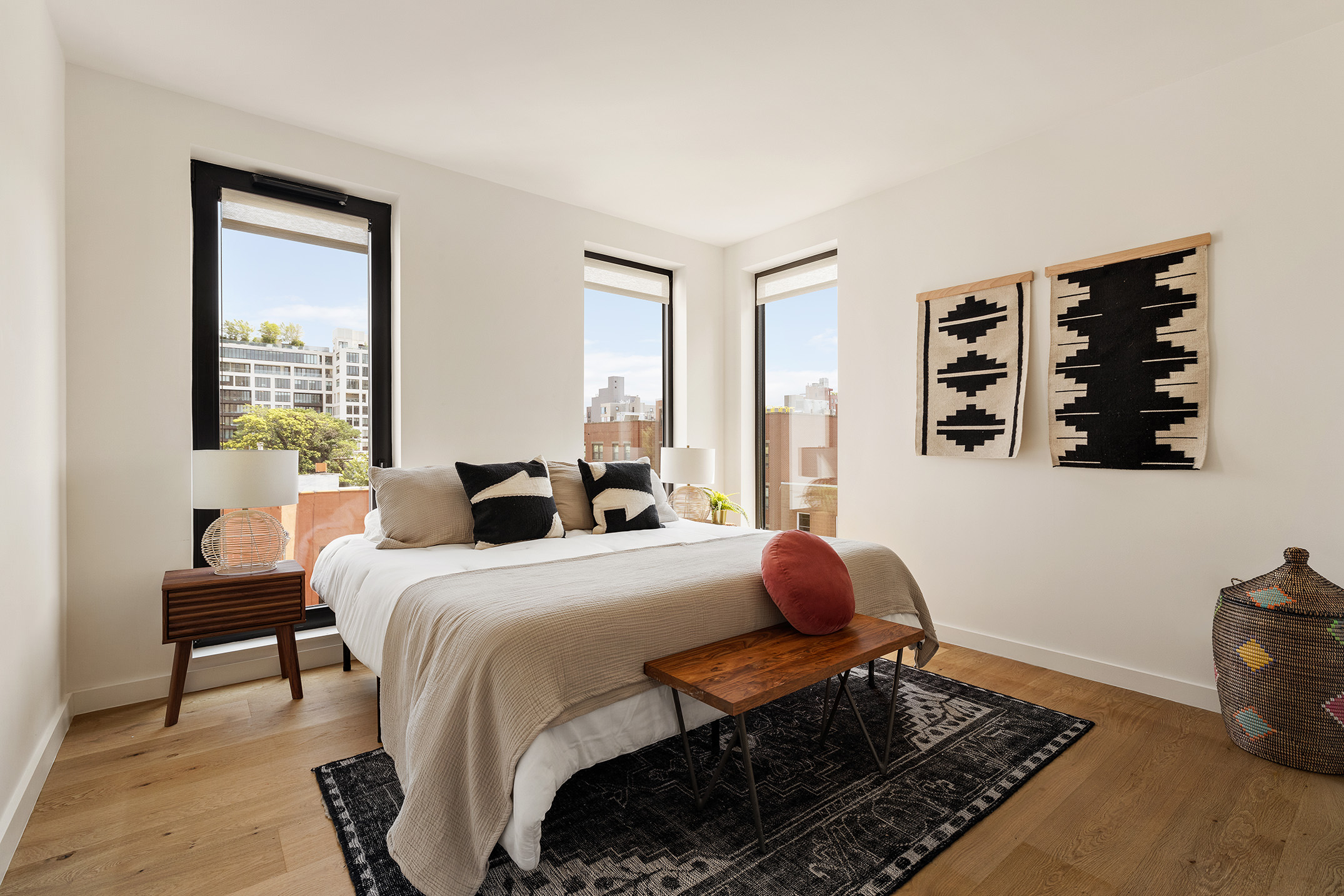 8 St Marks Place, Unit 6A Brooklyn, NY 11217 - Photo 7 of 11 a bedroom with a bed and wooden floor