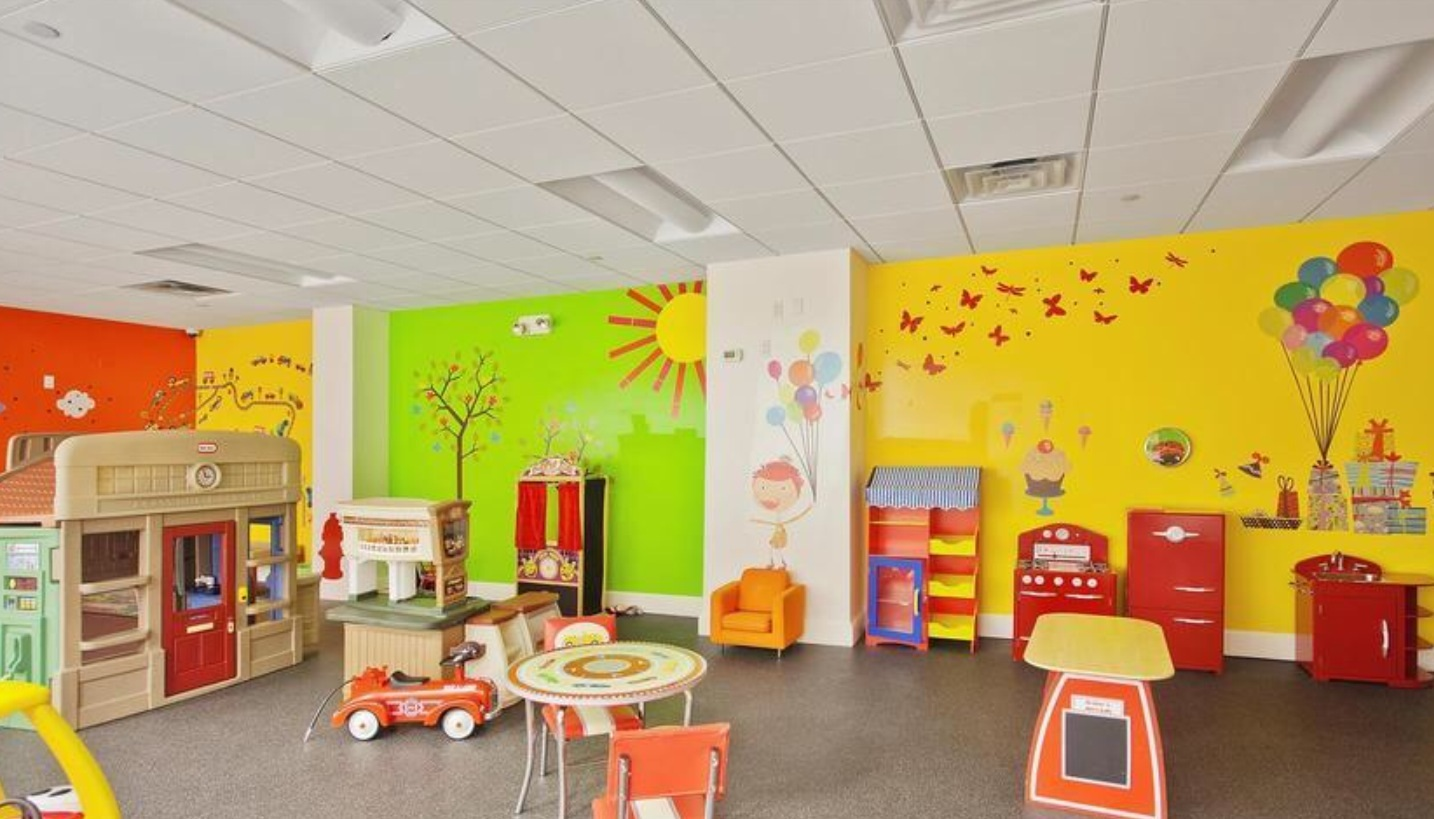 120 East 87th Street, Unit R16G Manhattan, NY 10128 - Photo 18 of 20 a living room with patio furniture and a floor to ceiling window