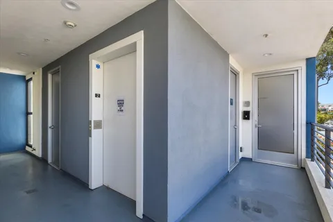 a view of a hallway with closet