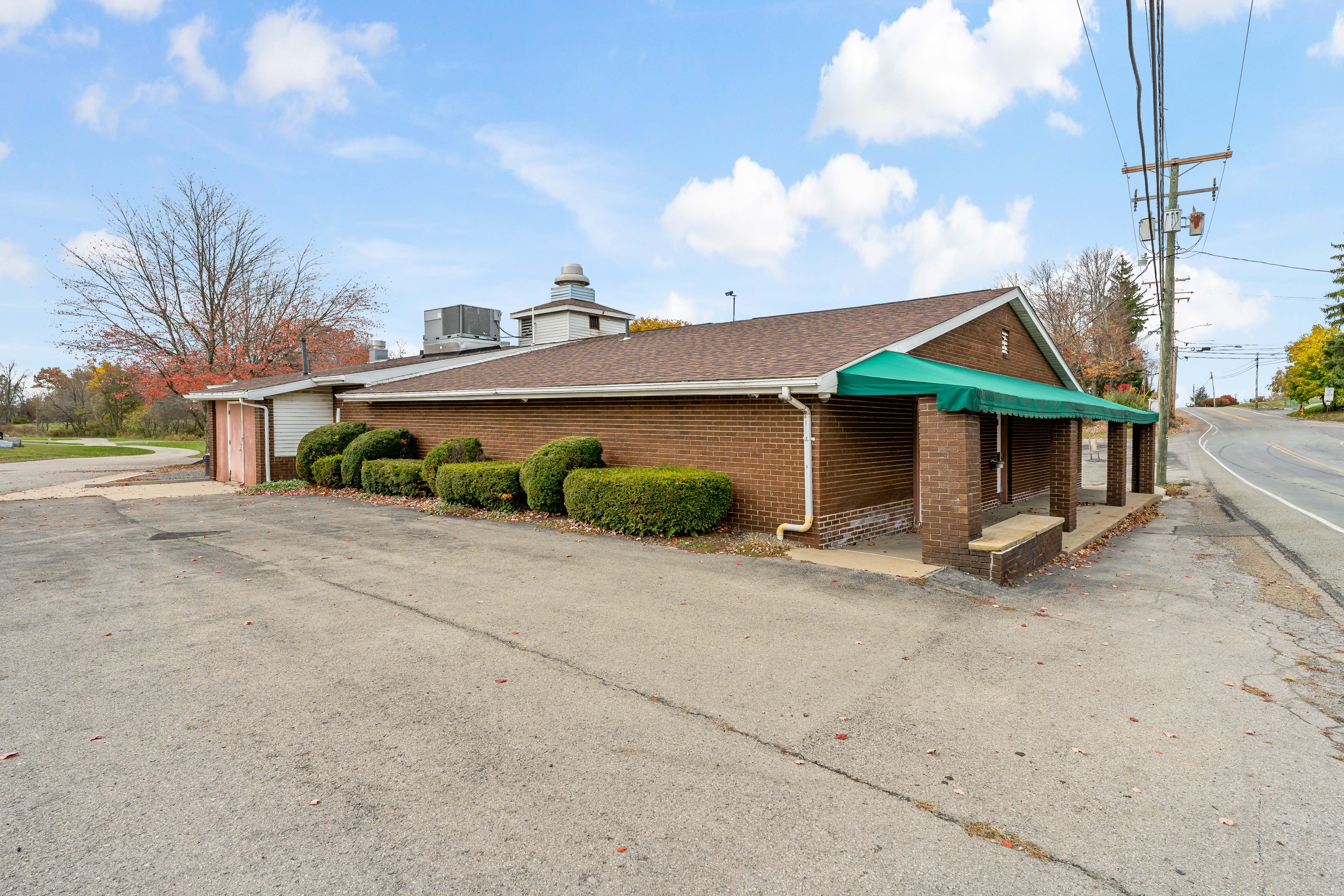 180 Butler Road Saxonburg, PA 16056 - Photo 3 of 52 a view of a house with a patio and a yard
