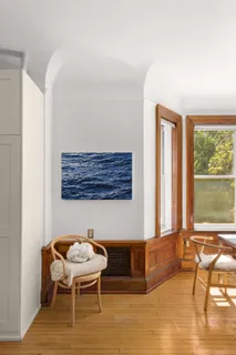 a room with a table and chairs