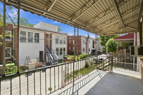 a view of a house with a small porch
