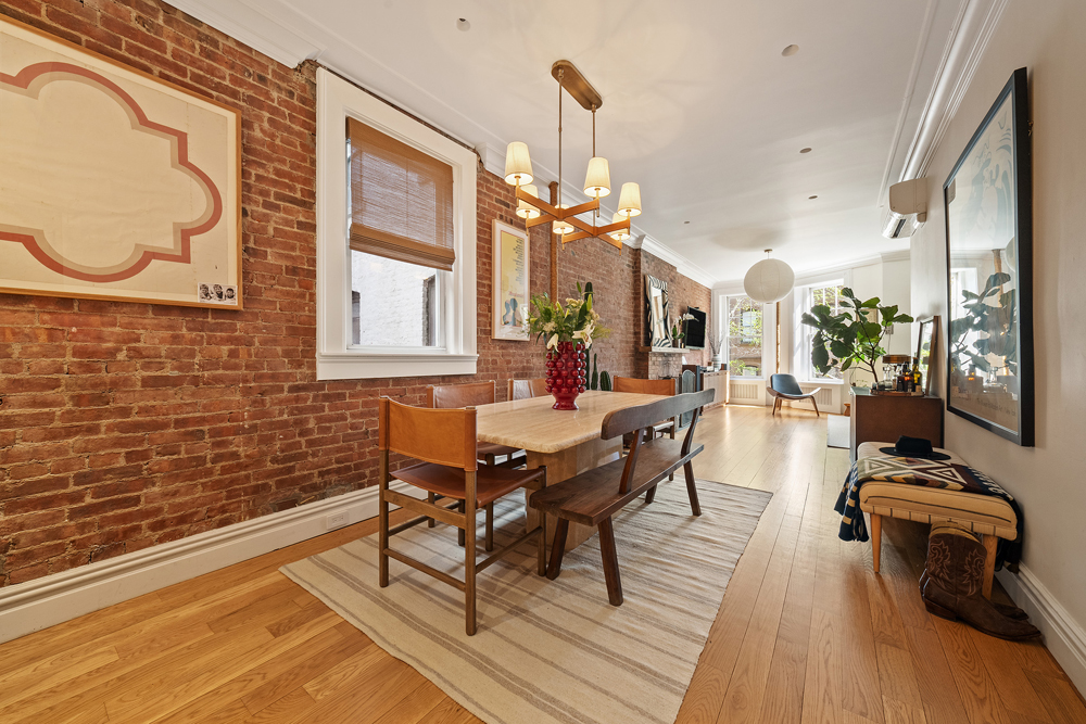 67 Perry Street, Unit 3 Manhattan, NY 10014 - Photo 4 of 22 a view of a dining room with furniture window and wooden floor
