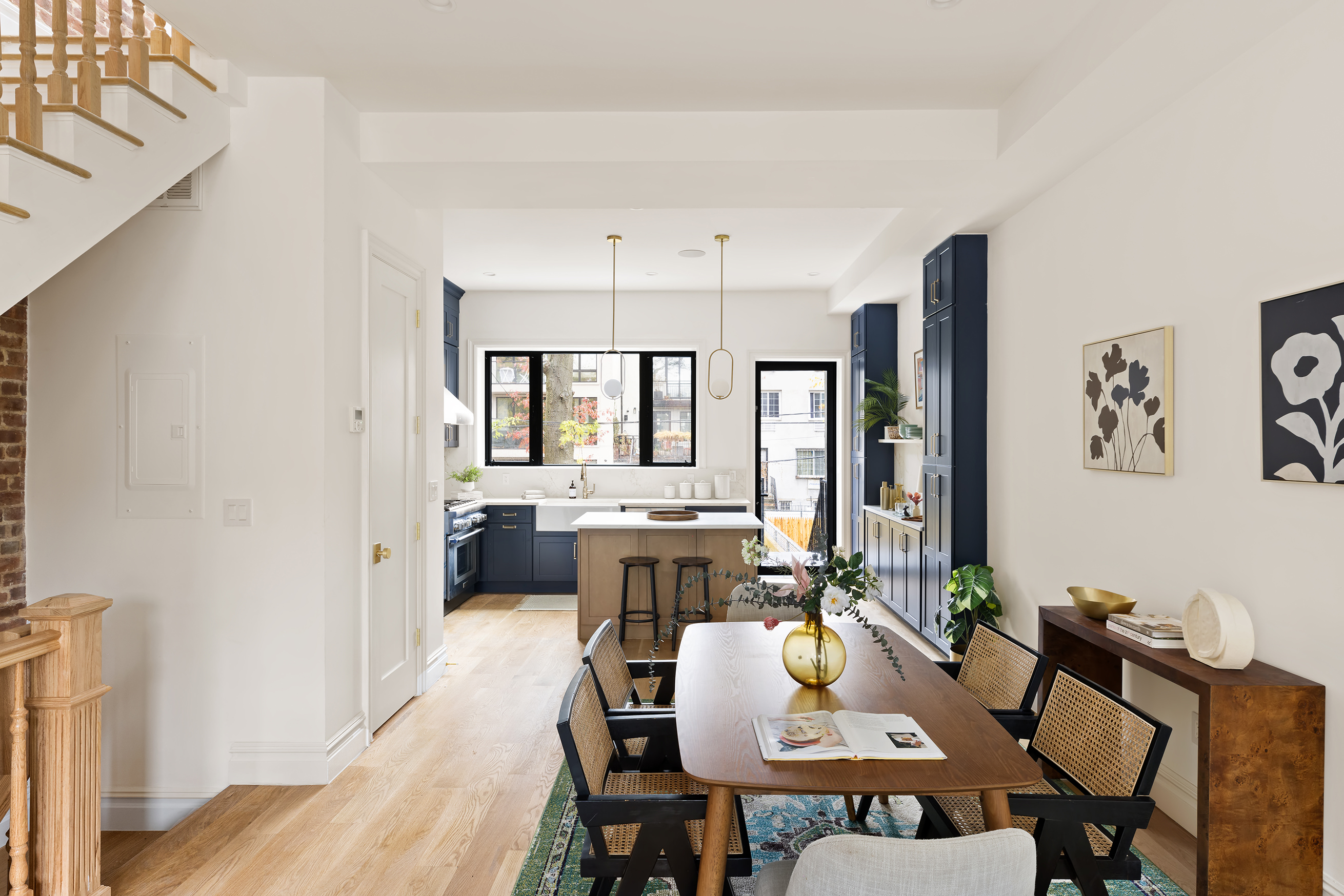 601 Halsey Street Brooklyn, NY 11233 - Photo 3 of 14 a view of a dining room with furniture and wooden floor