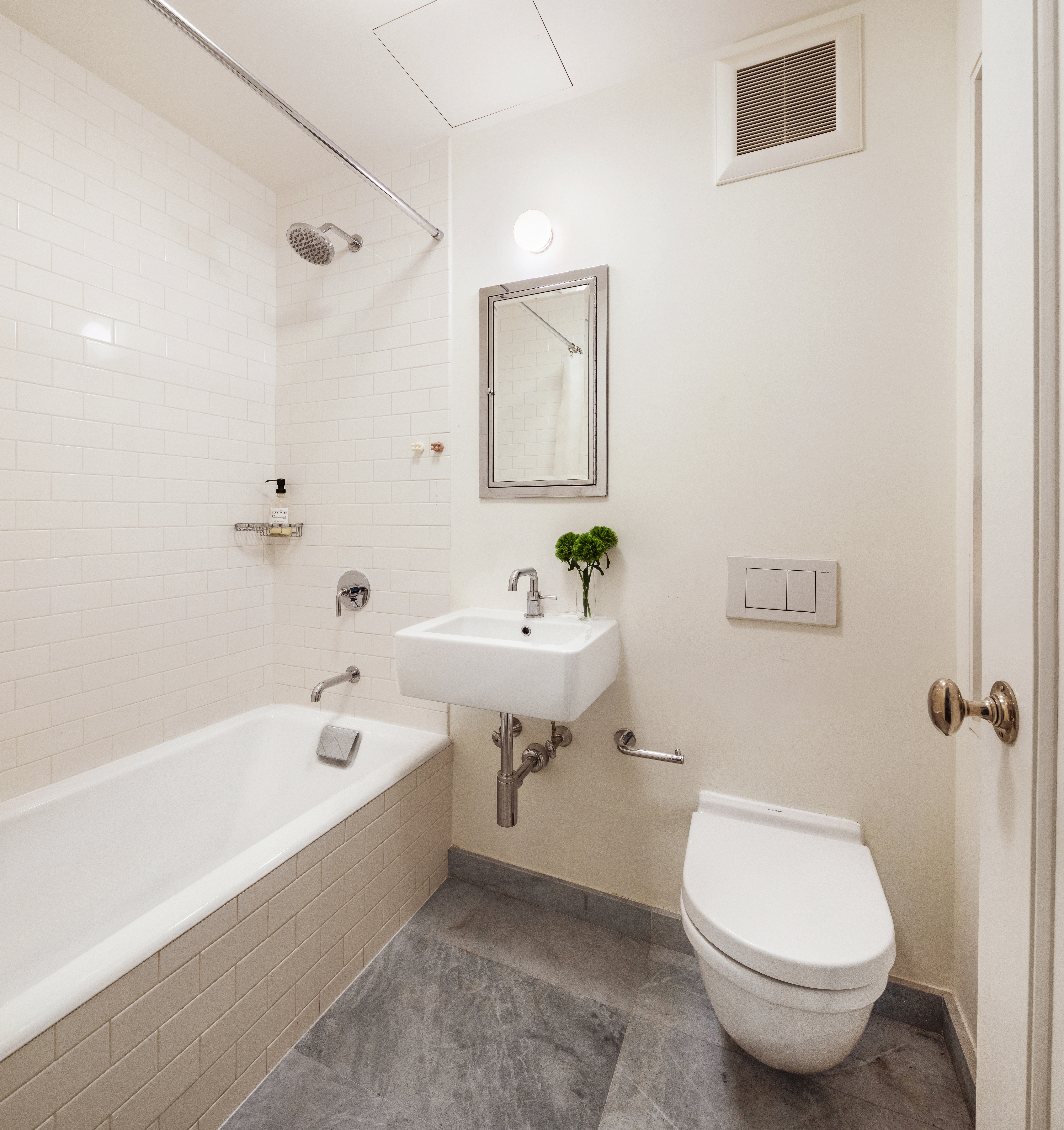 41 Pierrepont Street, Unit 4 Brooklyn, NY 11201 - Photo 10 of 12 a bathroom with a sink a toilet and bathtub