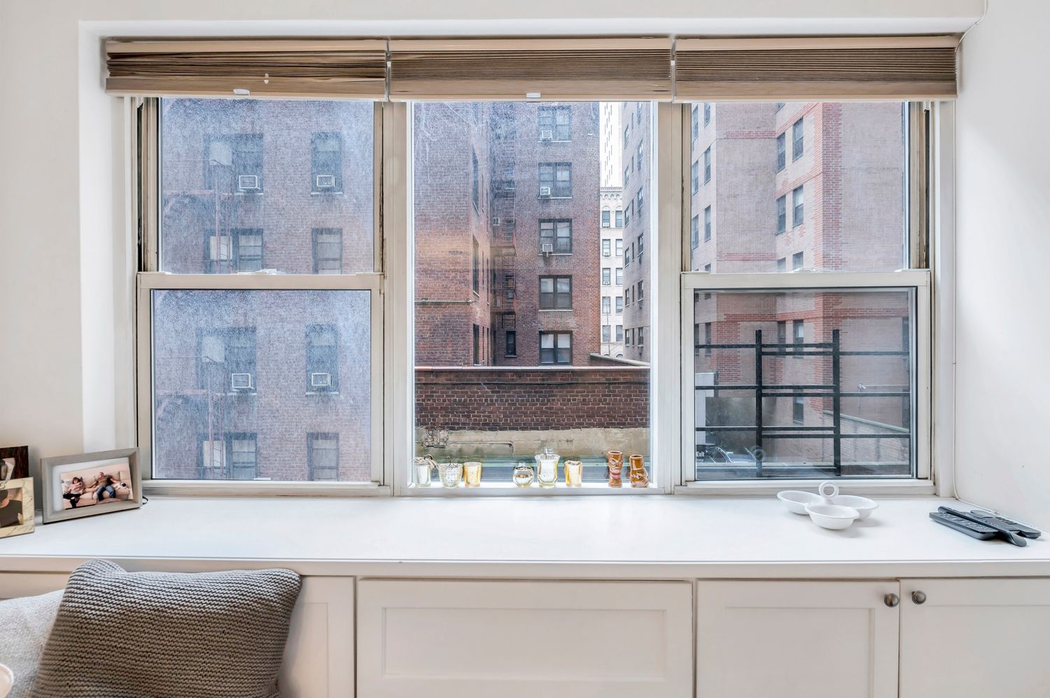 333 East 79th Street, Unit 2R Manhattan, NY 10075 - Photo 9 of 13 a bathroom with a sink and a mirror